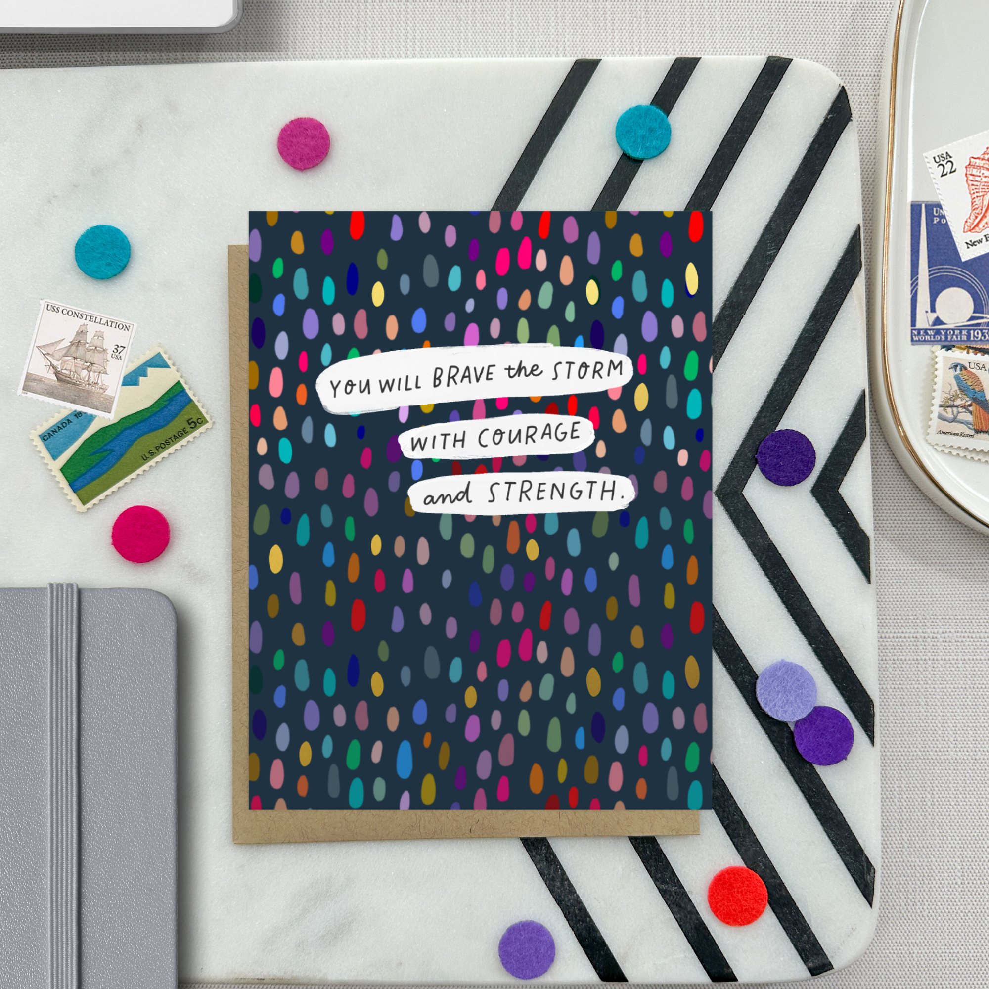 A friendship greeting card with a colorful dotted pattern and the text 'You will brave the storm with courage and strength' on it.