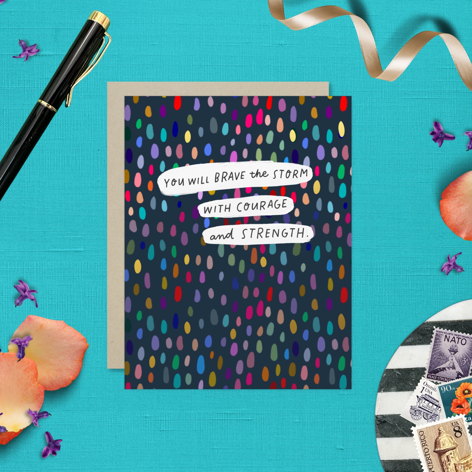 A friendship greeting card with a colorful dotted pattern and the text 'You will brave the storm with courage and strength' on it.