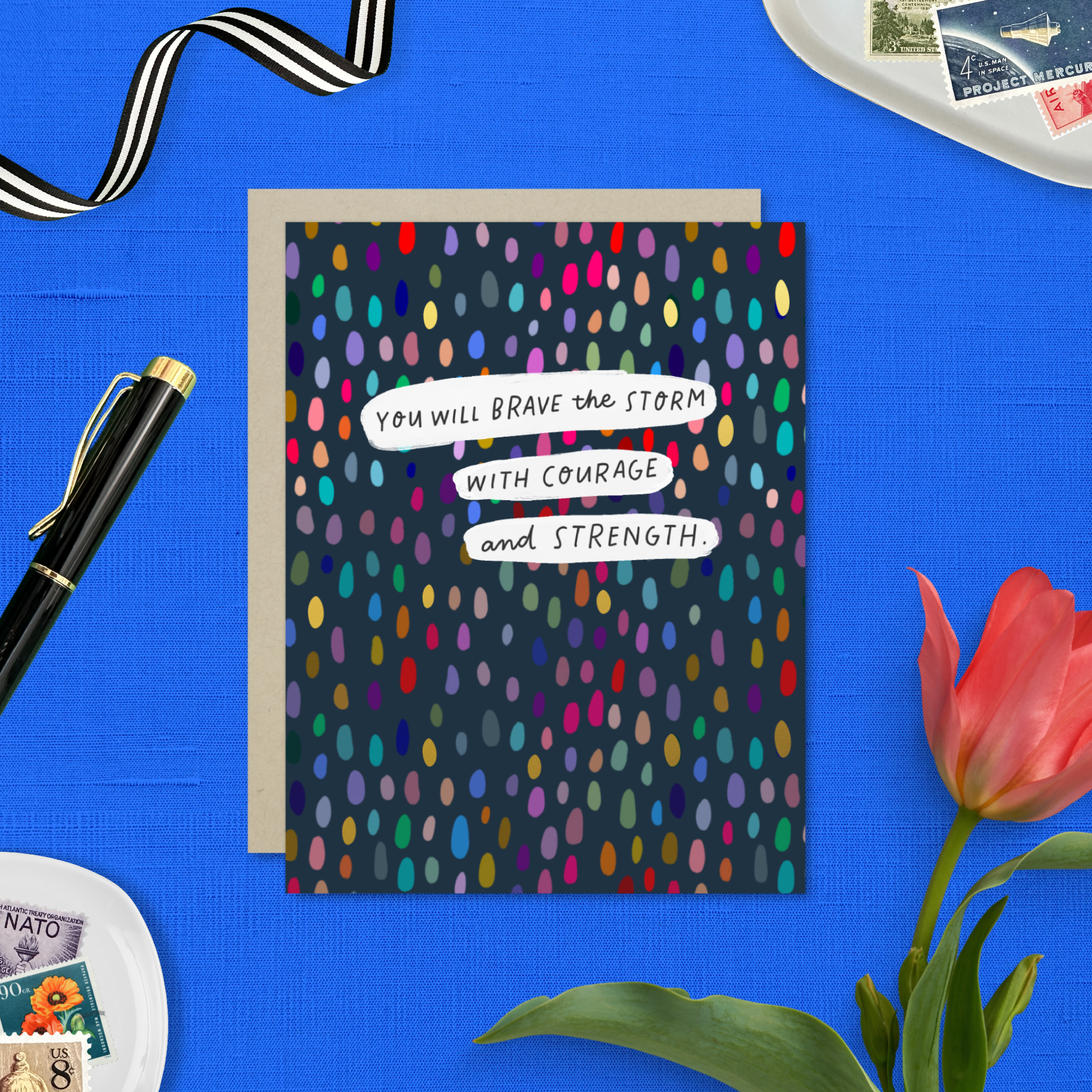 A friendship greeting card with a colorful dotted pattern and the text 'You will brave the storm with courage and strength' on it.