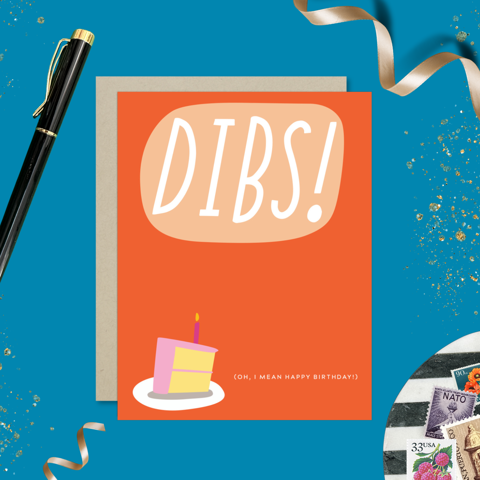 Card with 'DIBS! (Oh, I mean happy birthday! )' text and a cake illustration on an orange background.