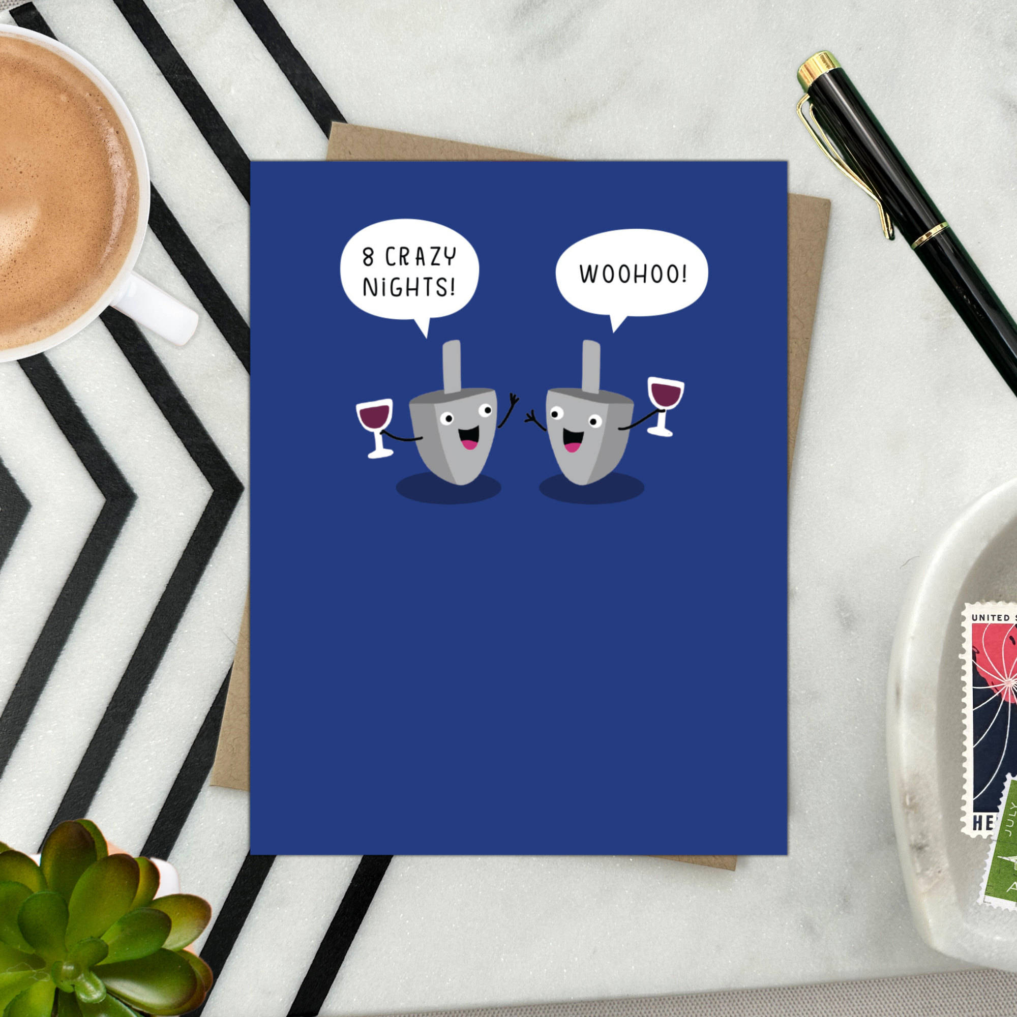 Hannukah greeting card with 2 dreidels drinking. One is saying '8 crazy nights' the other says 'woohoo!'