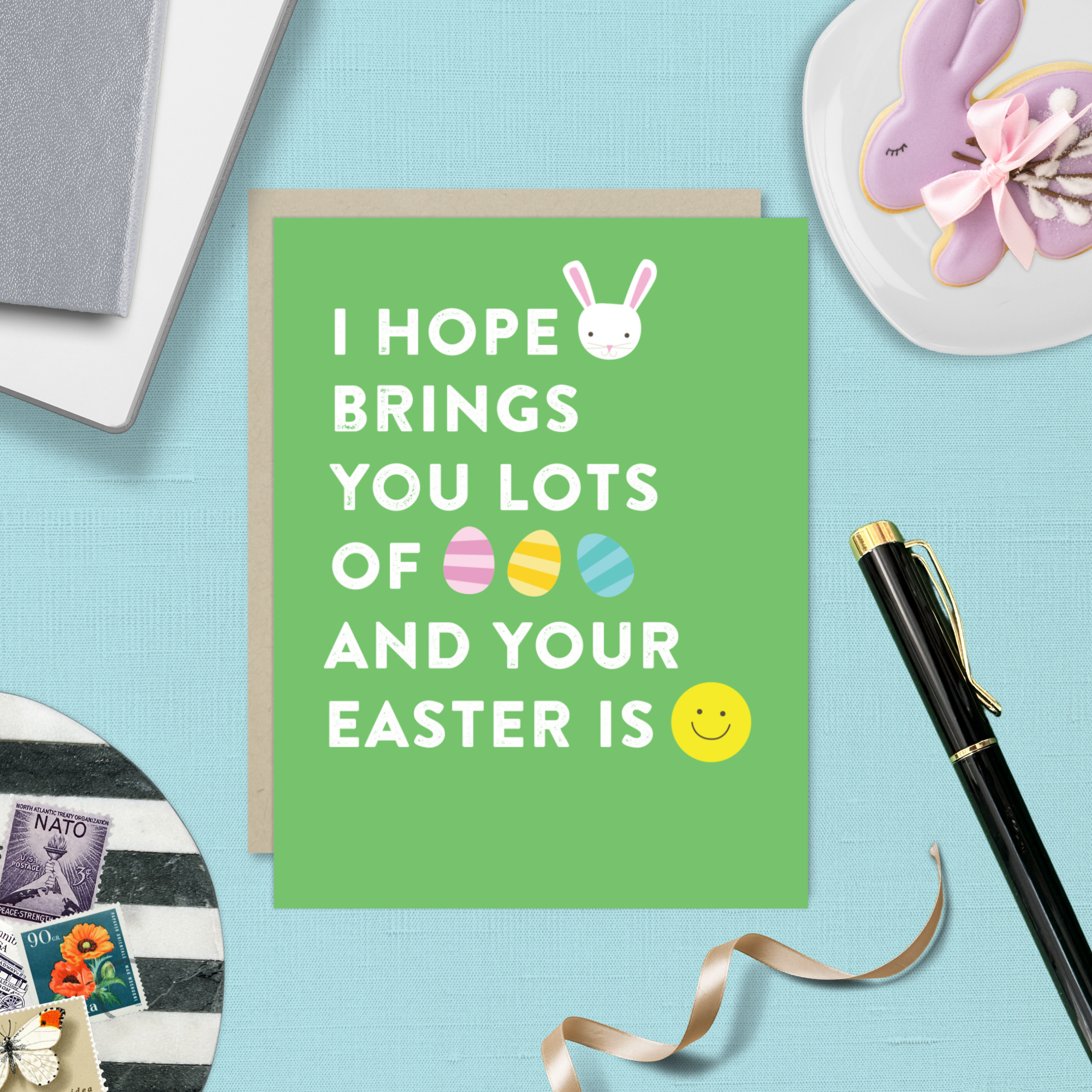 easter greeting card with text 'I hope your (bunny emoji) brings you lots of (egg emoji) and your easter is (smile emoji'