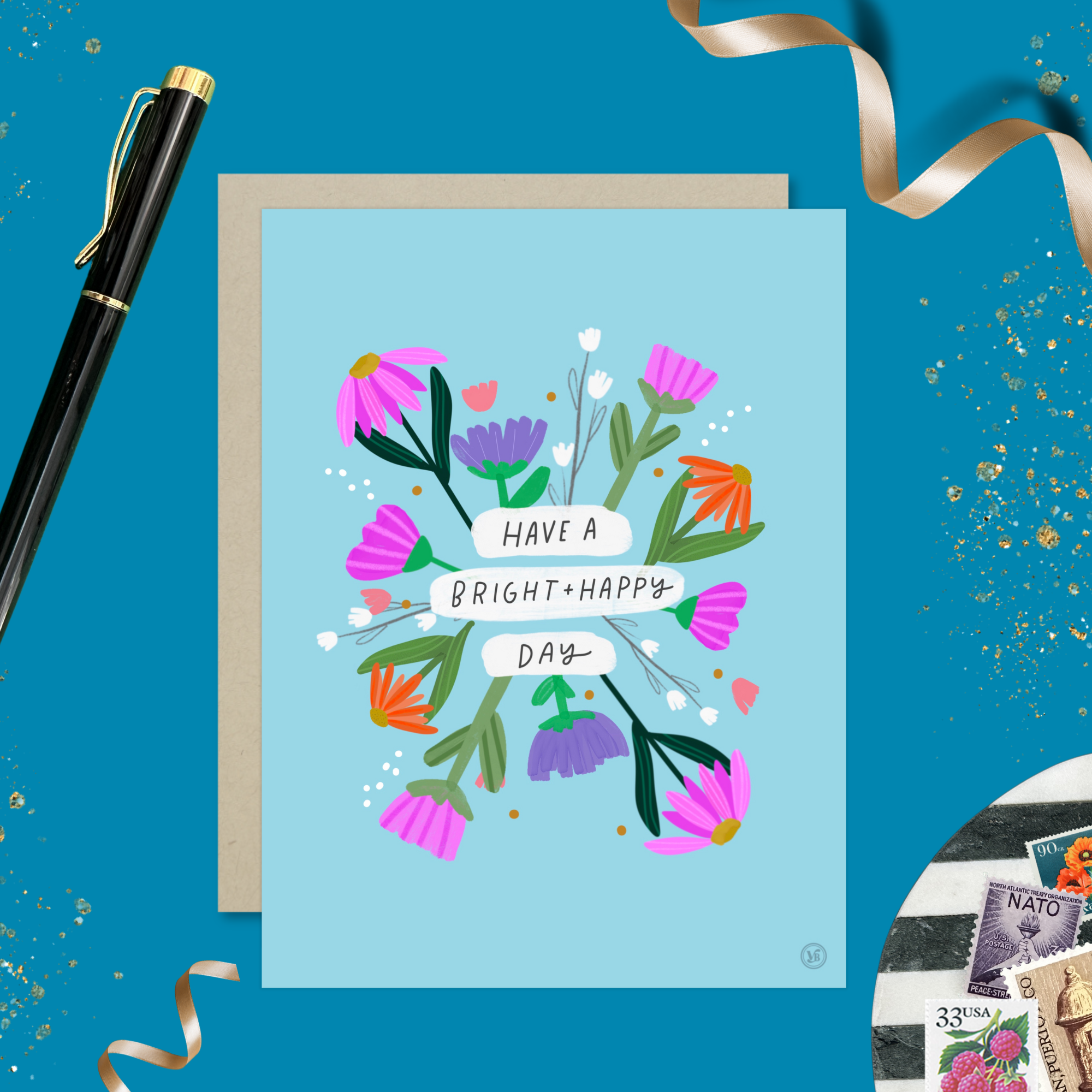 A colorful birthday greeting card with illustrated flowers and the text 'HAVE A BRIGHT & HAPPY DAY' on it