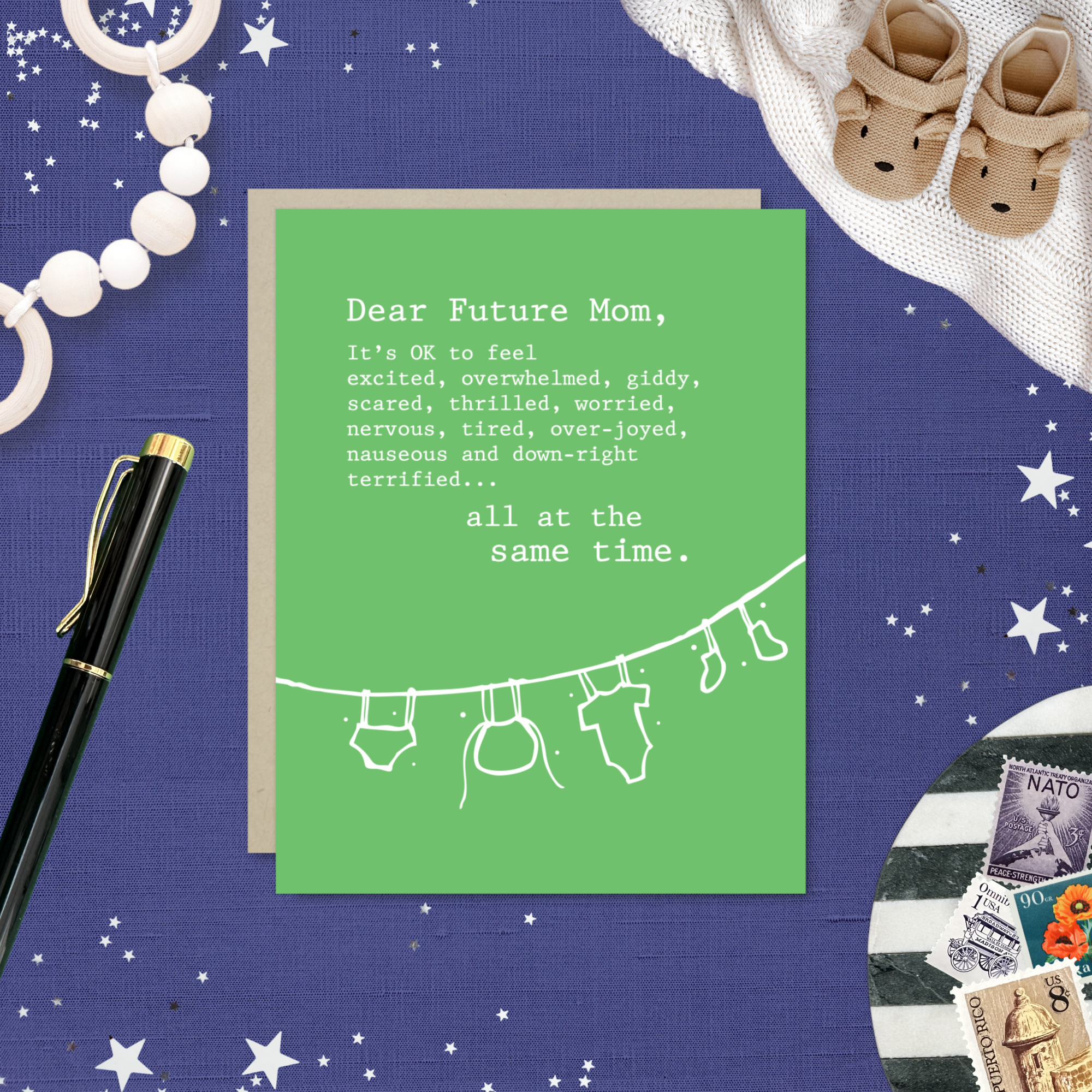 Baby greeting card with clothes hanging and 'dear future mom...' text
