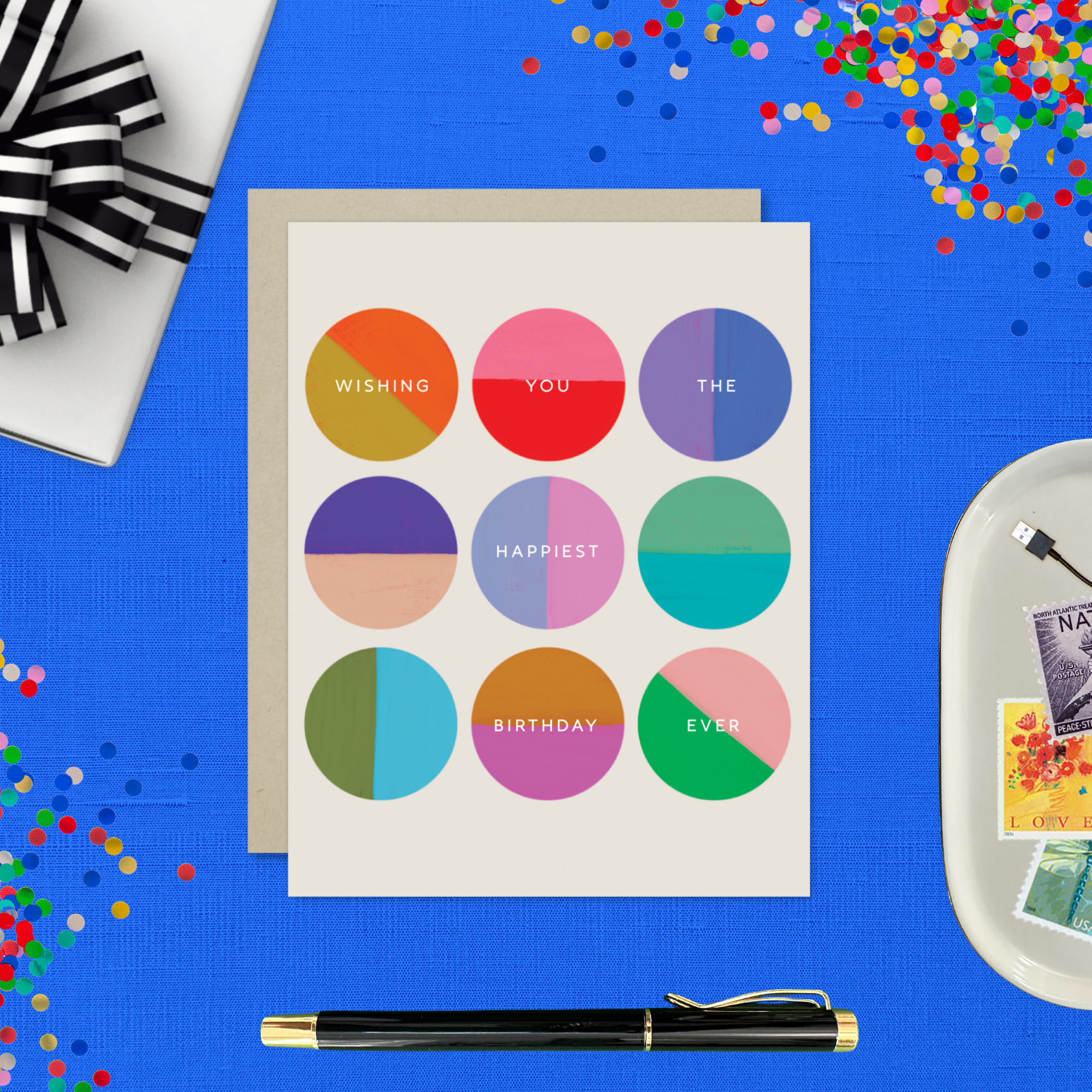 A colorful birthday greeting card with multiple circles in different shades, each containing a wish for the recipient's happiest birthday ever