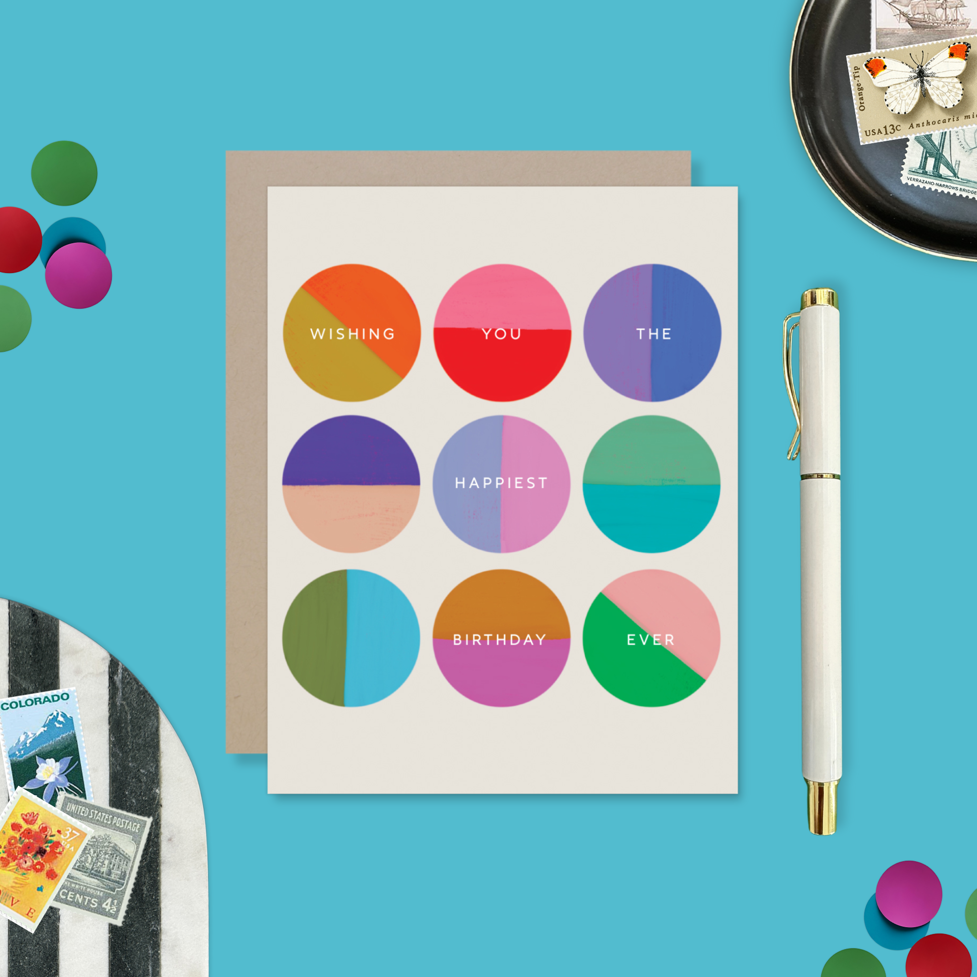 A colorful birthday greeting card with multiple circles in different shades, each containing a wish for the recipient's happiest birthday ever