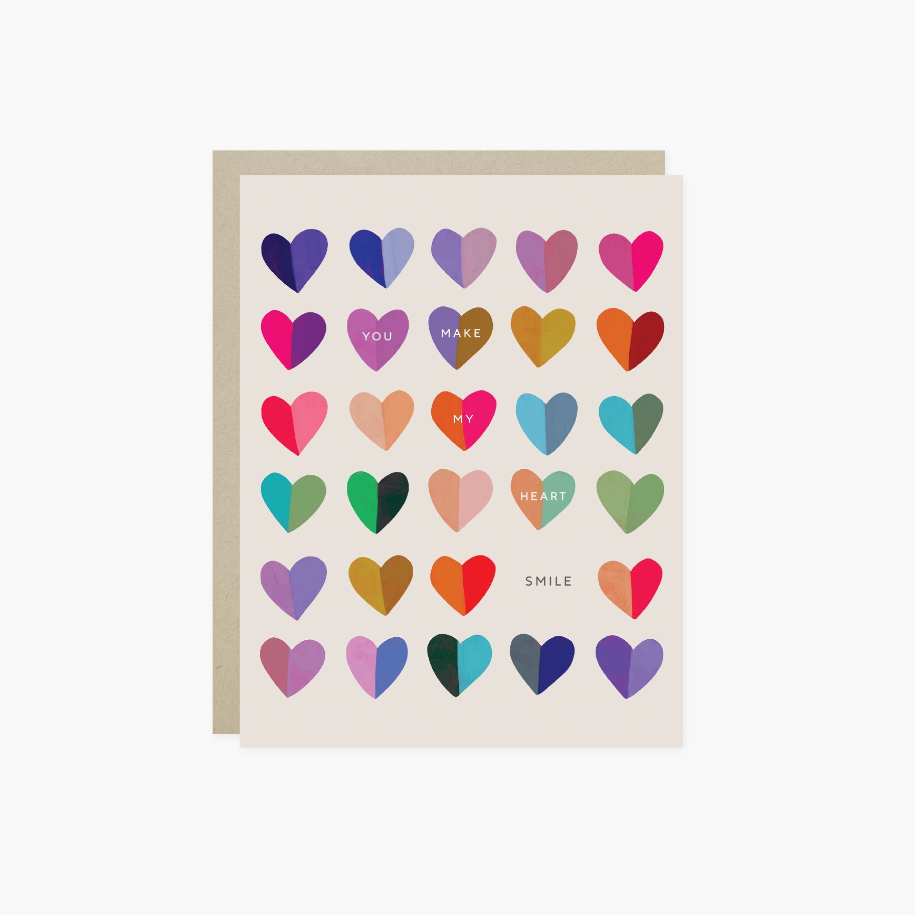 A valentines day greeting card with a cheerful grid of colorful hearts and the message 'You make my heart smile' written on it.