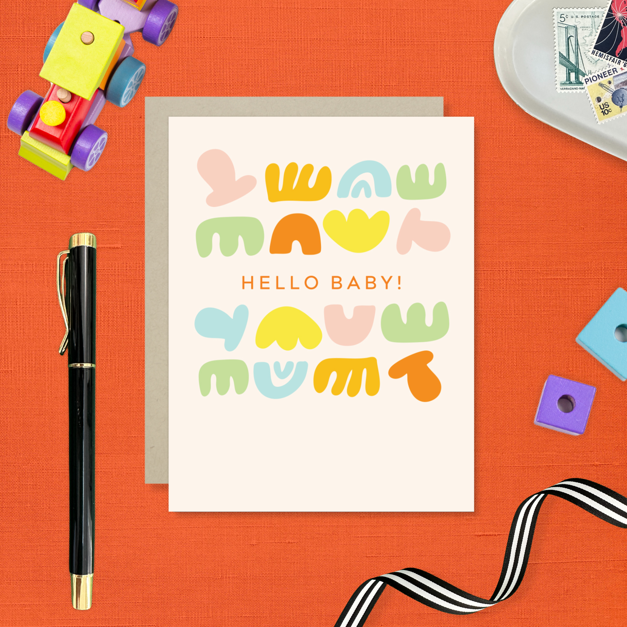 Baby greeting card with colorful shapes and 'hello baby!' text