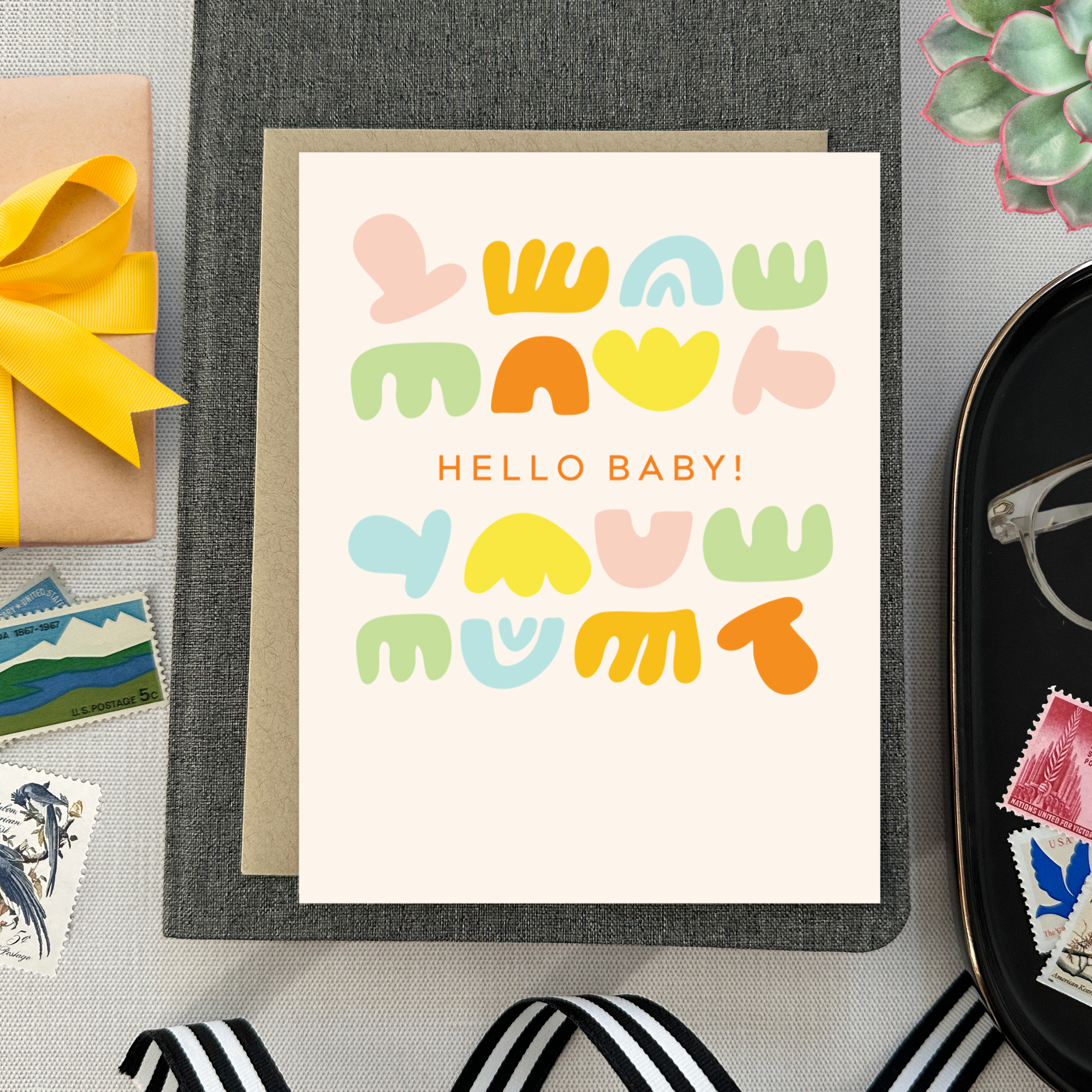 Baby greeting card with colorful shapes and 'hello baby!' text