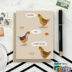 Easter greeting card with 3 chickens and 3 eggs with the text 'wishing you a happy easter