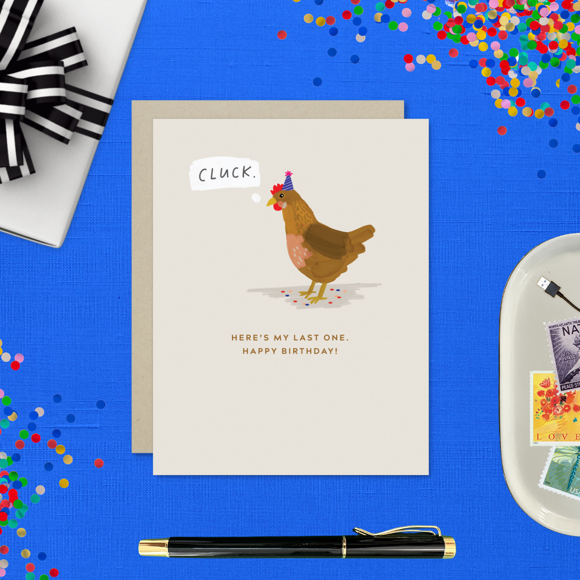 A funny birthday greeting card with an illustration of a chicken wearing a birthday hat, with the text 'Cluck. Here's my last one'