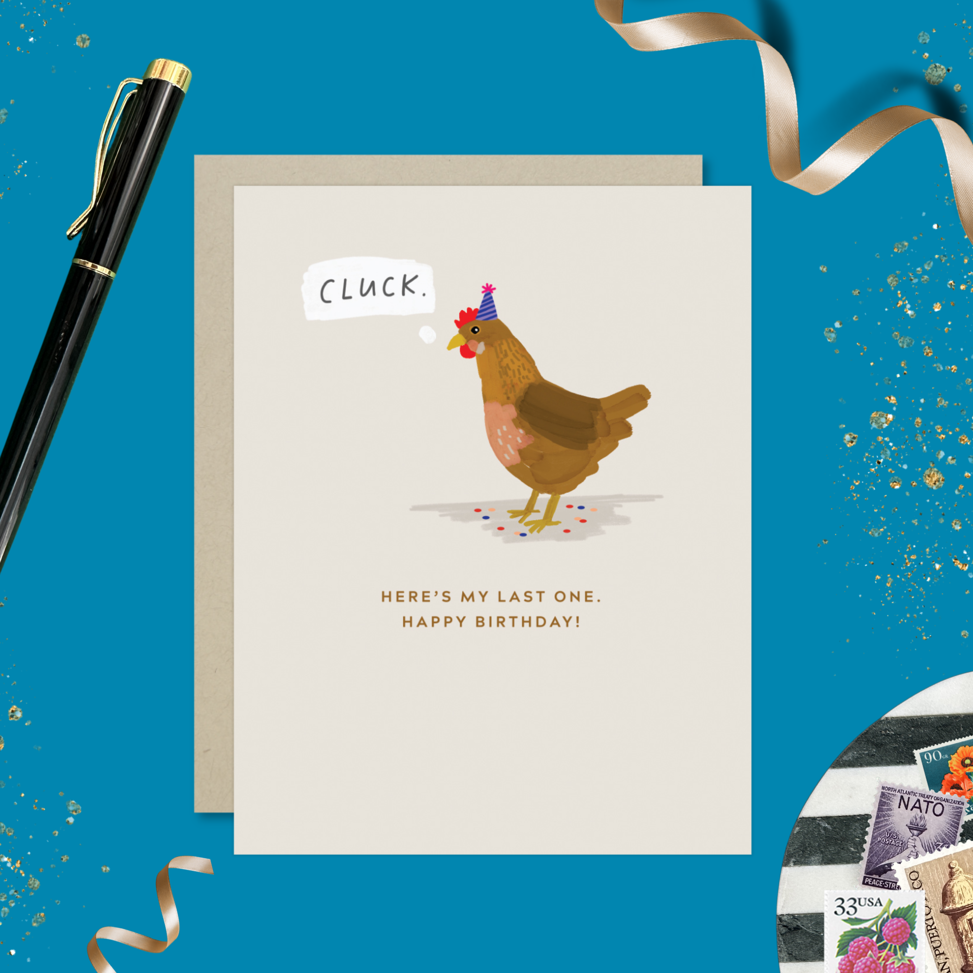 A funny birthday greeting card with an illustration of a chicken wearing a birthday hat, with the text 'Cluck. Here's my last one'