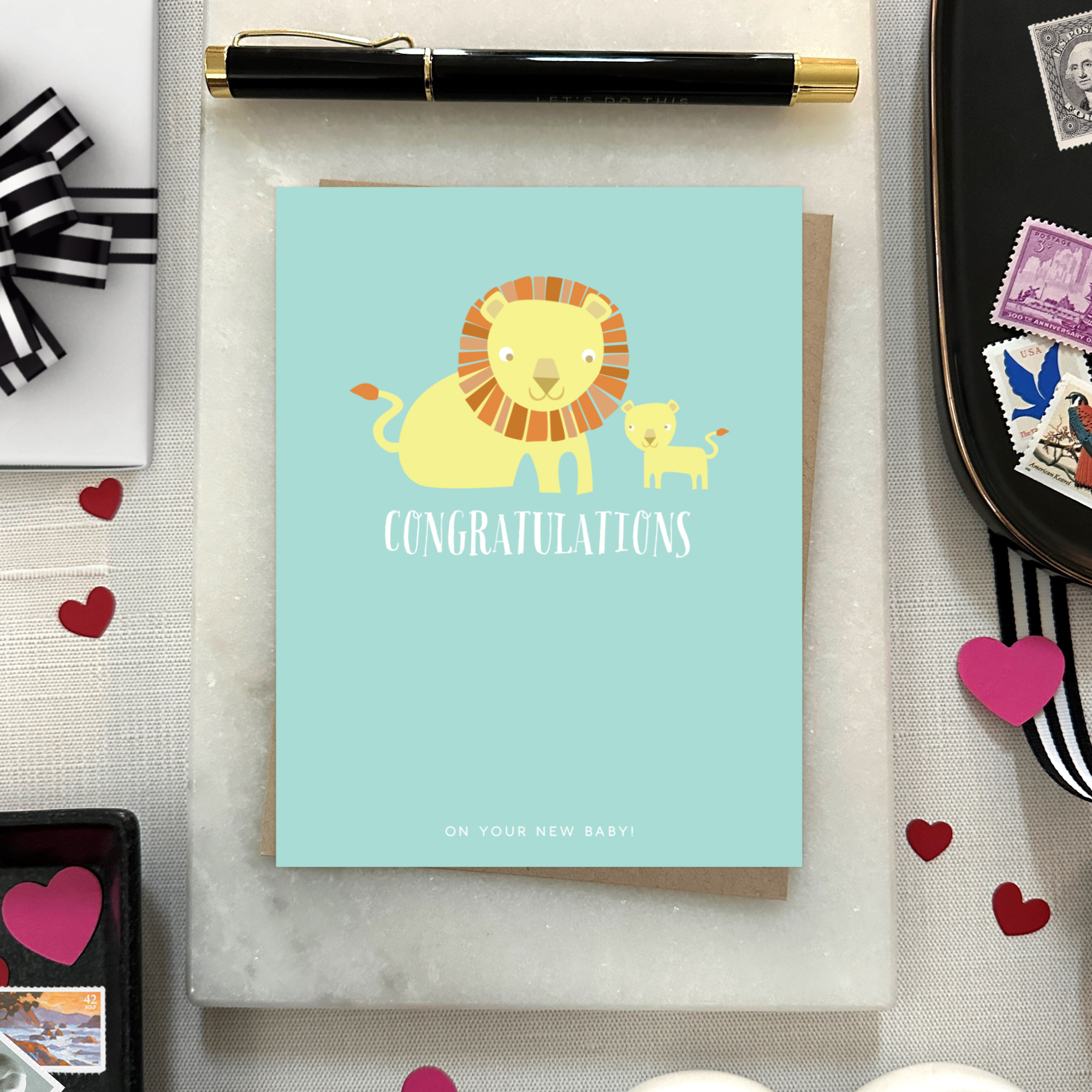 Baby greeting card with 2 lions and 'congratulations' text