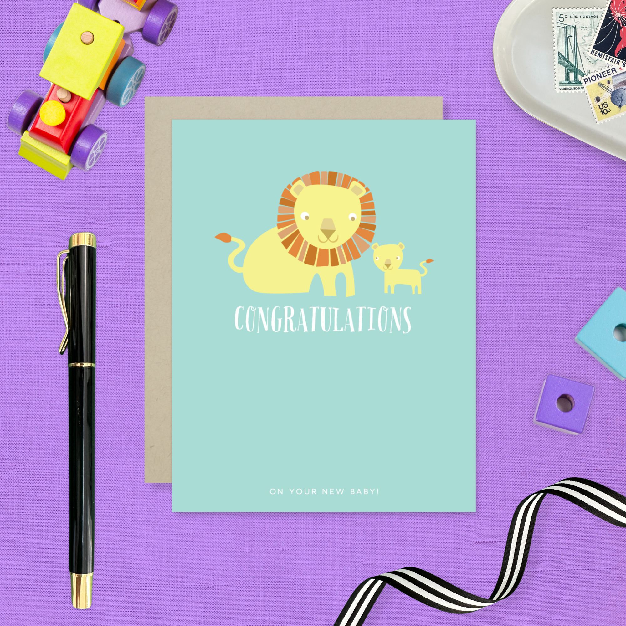 Baby greeting card with 2 lions and 'congratulations' text