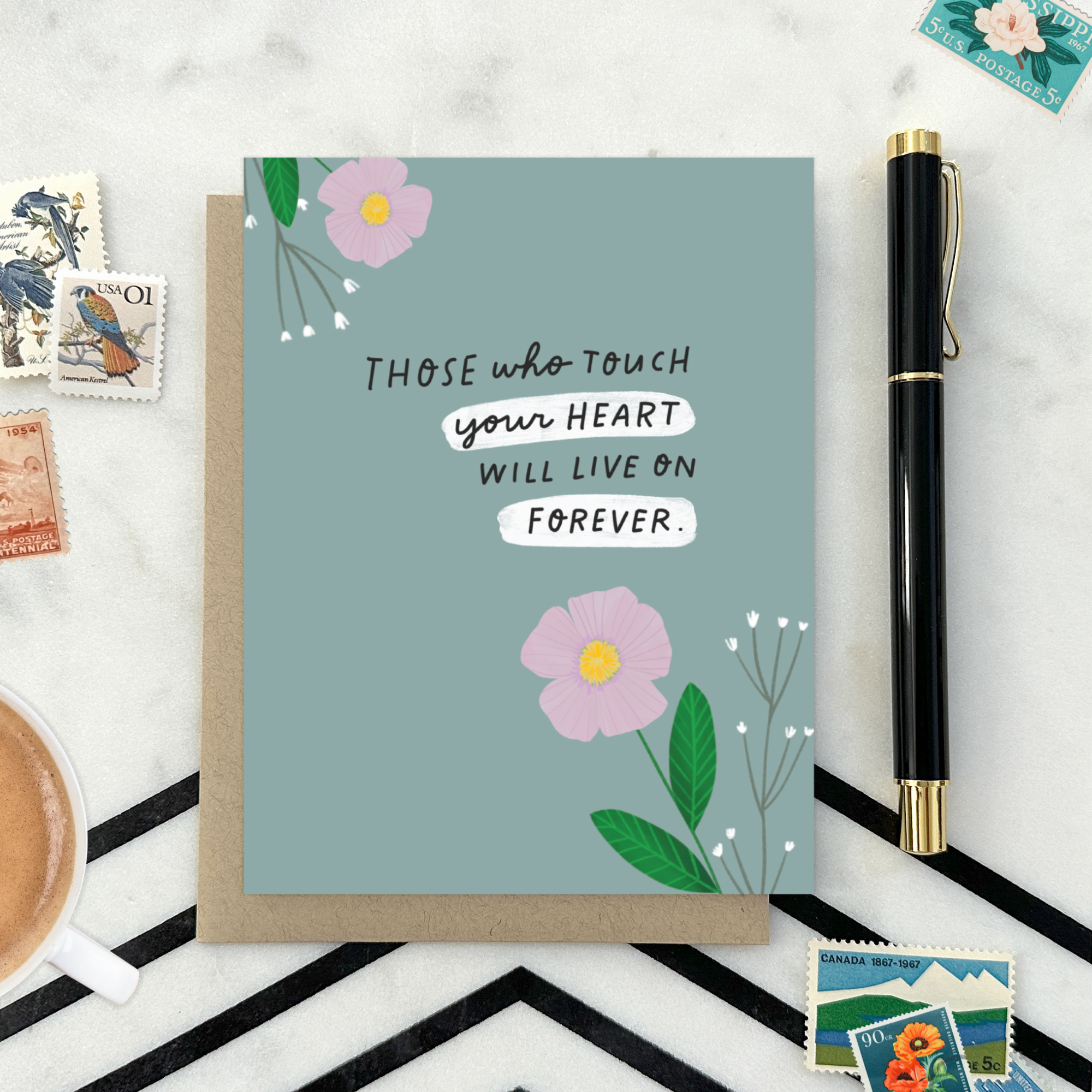Sympathy greeting card with 2 flowers and 'those who touch your heart will live on forever' text