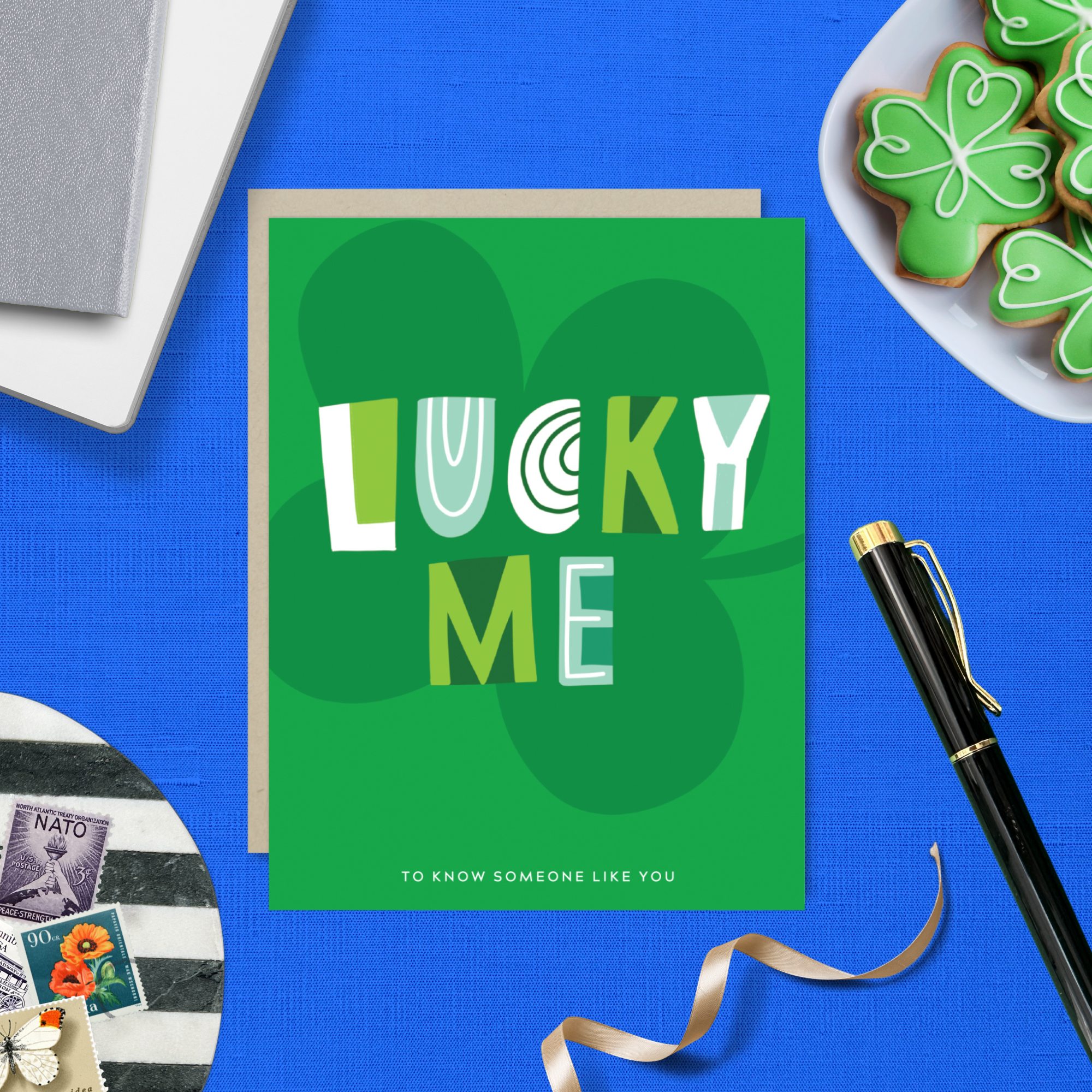 A st. patricks day greeting card with the text 'LUCKY ME' accompanied by the phrase 'TO KNOW SOMEONE LIKE YOU' on a background featuring a four-leaf clover