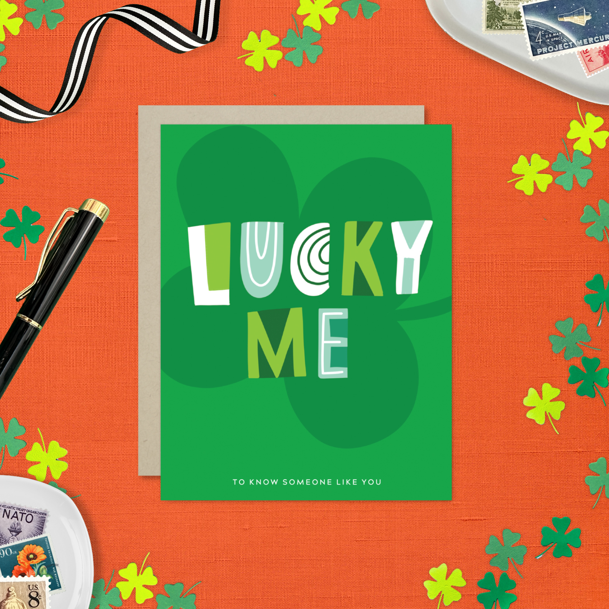 A st. patricks day greeting card with the text 'LUCKY ME' accompanied by the phrase 'TO KNOW SOMEONE LIKE YOU' on a background featuring a four-leaf clover