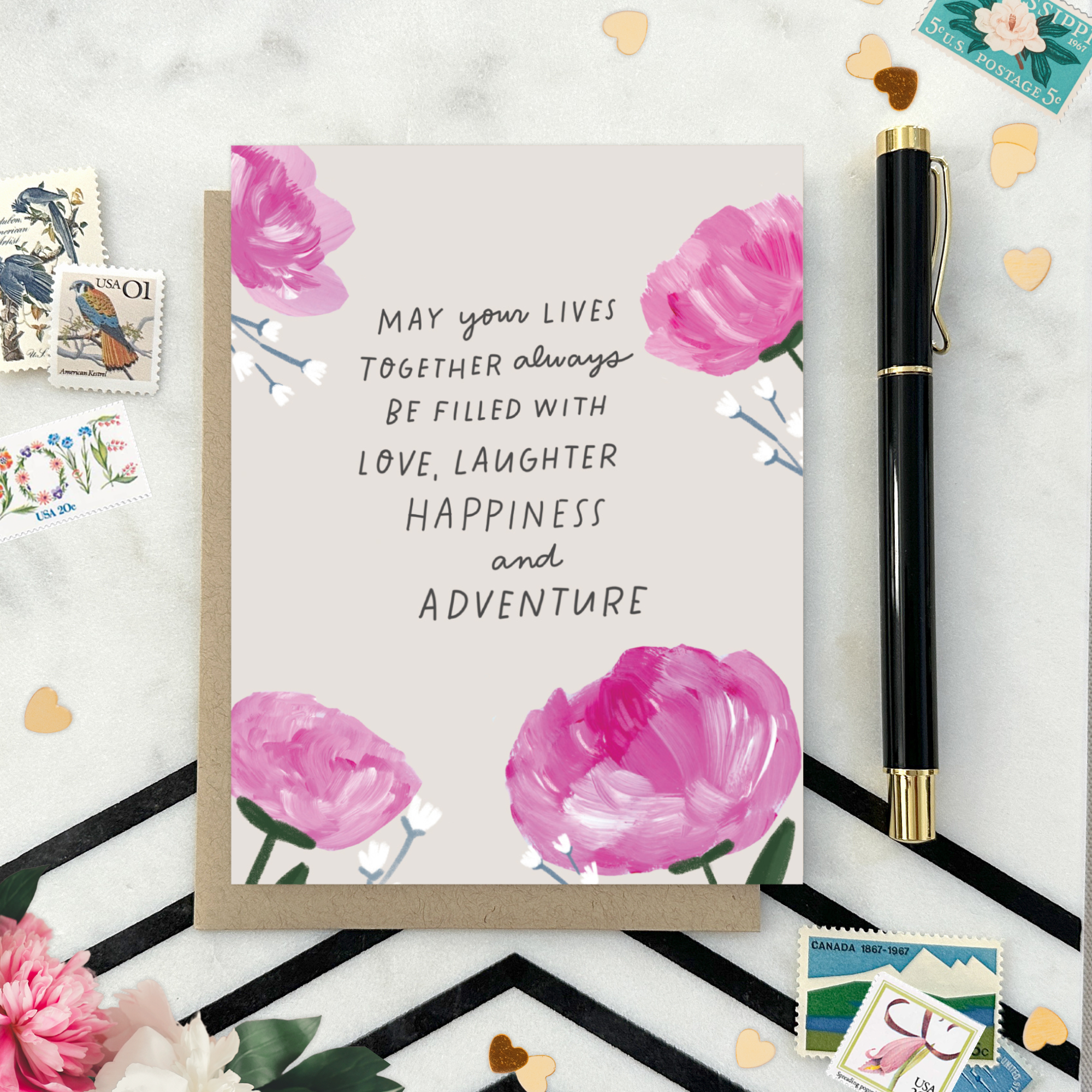 A wedding greeting card with hand-painted hydrangeas and a handwritten message.