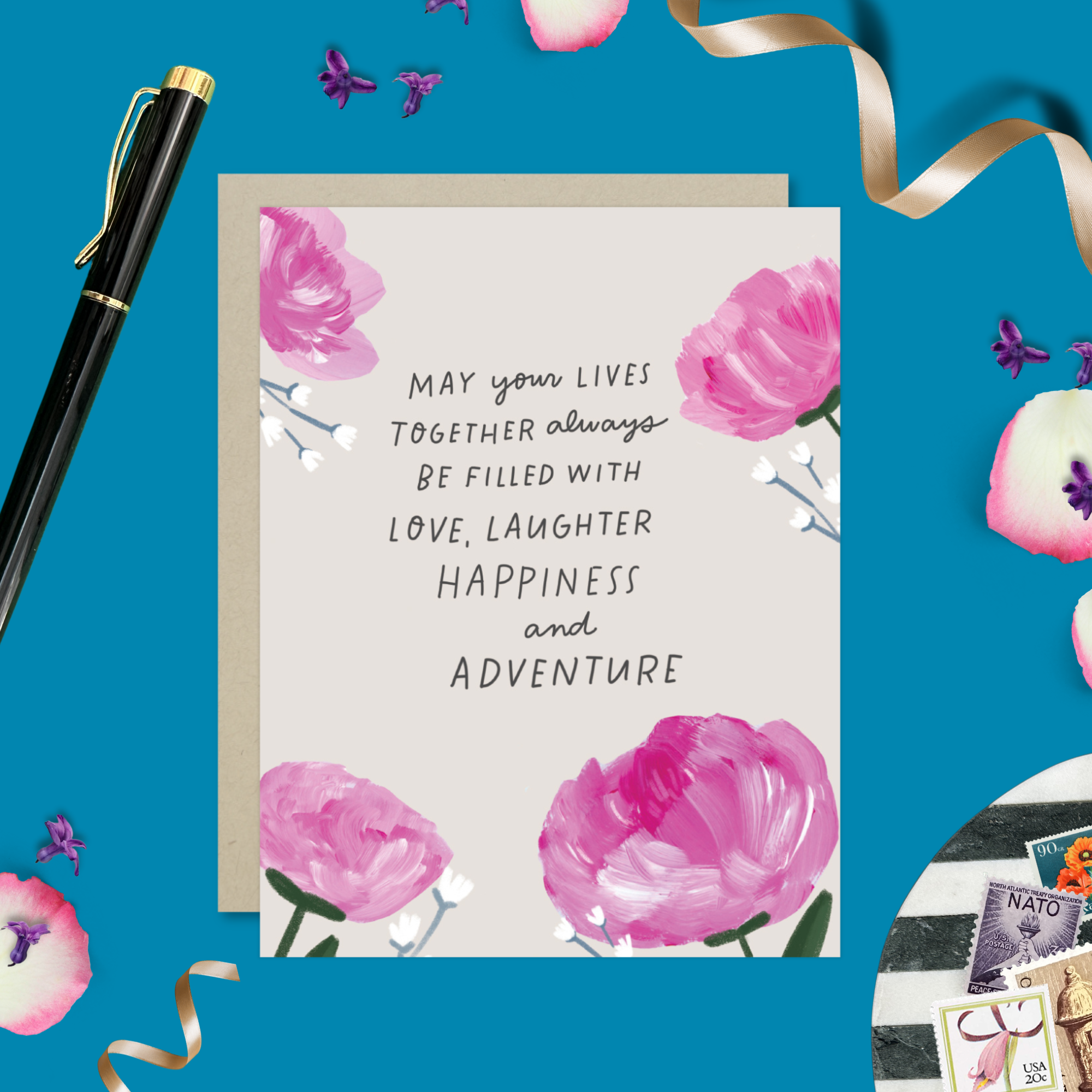 A wedding greeting card with hand-painted hydrangeas and a handwritten message.