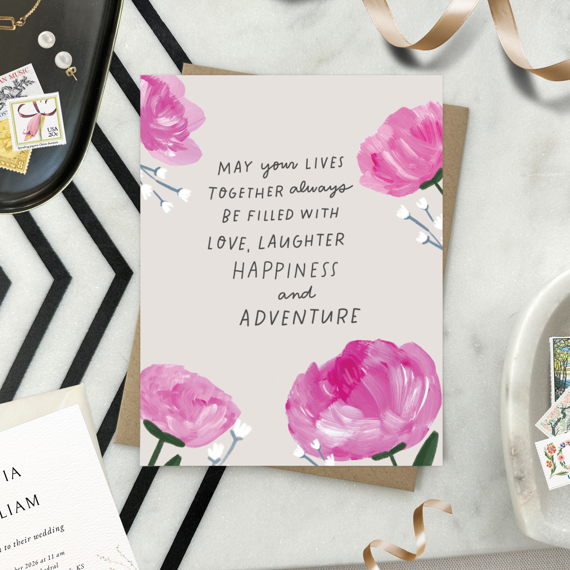 A wedding greeting card with hand-painted hydrangeas and a handwritten message.