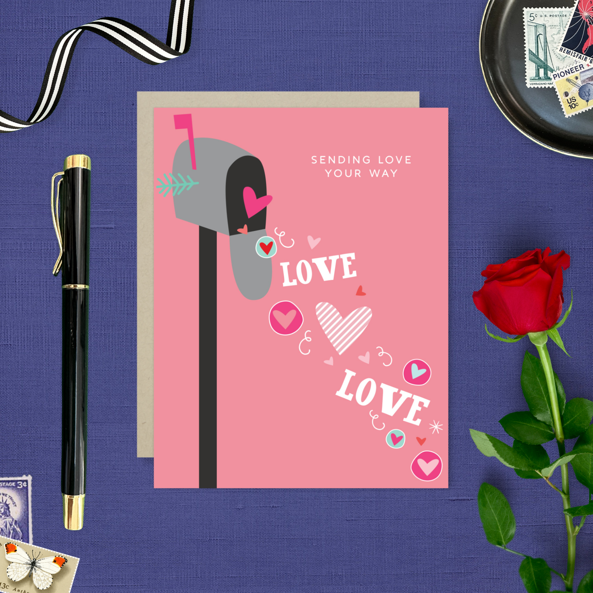A Valentine's Day greeting card featuring a whimsical mailbox overflowing with love and playful hearts