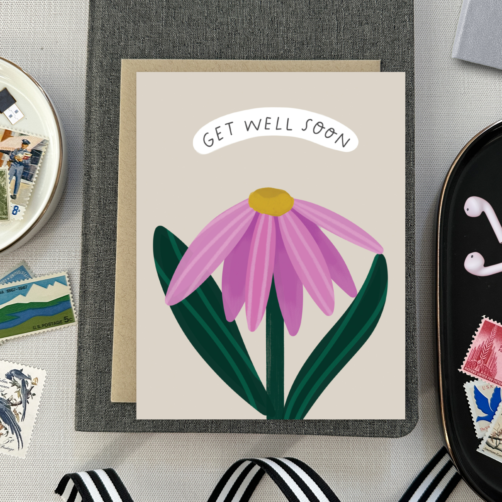 Get well soon greeting card with a single flower