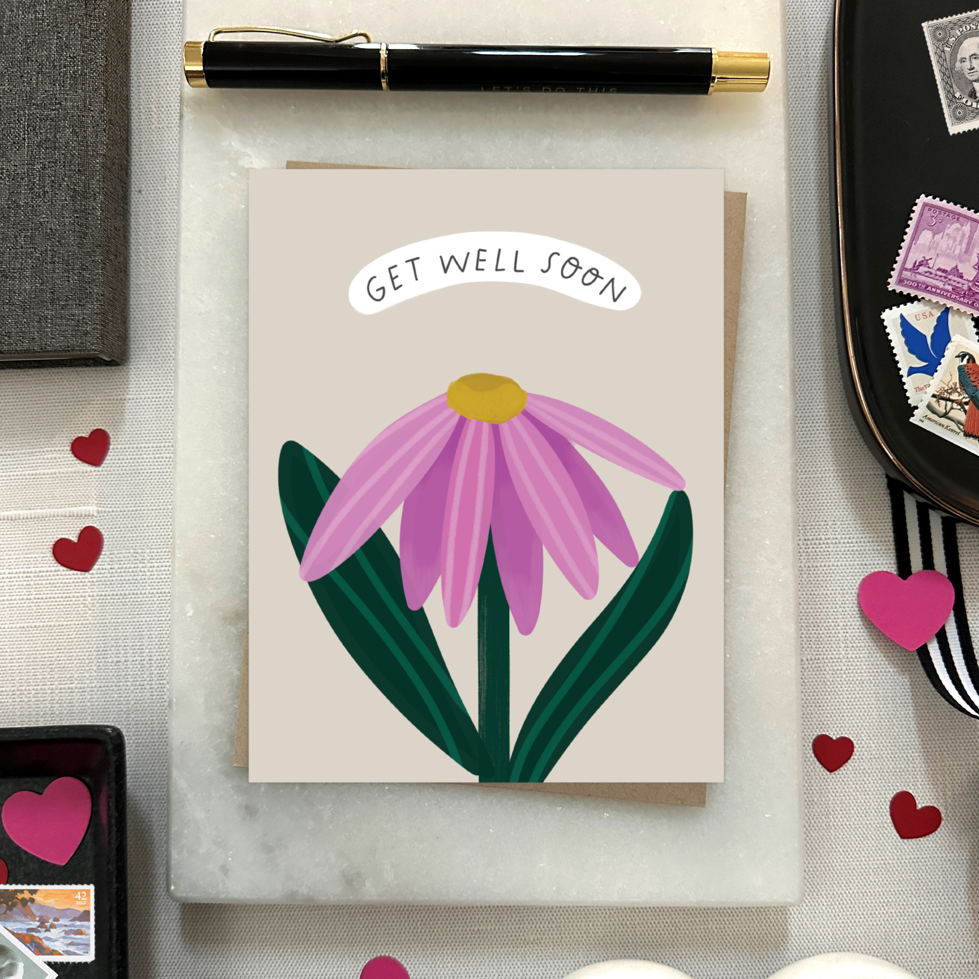 Get well soon greeting card with a single flower