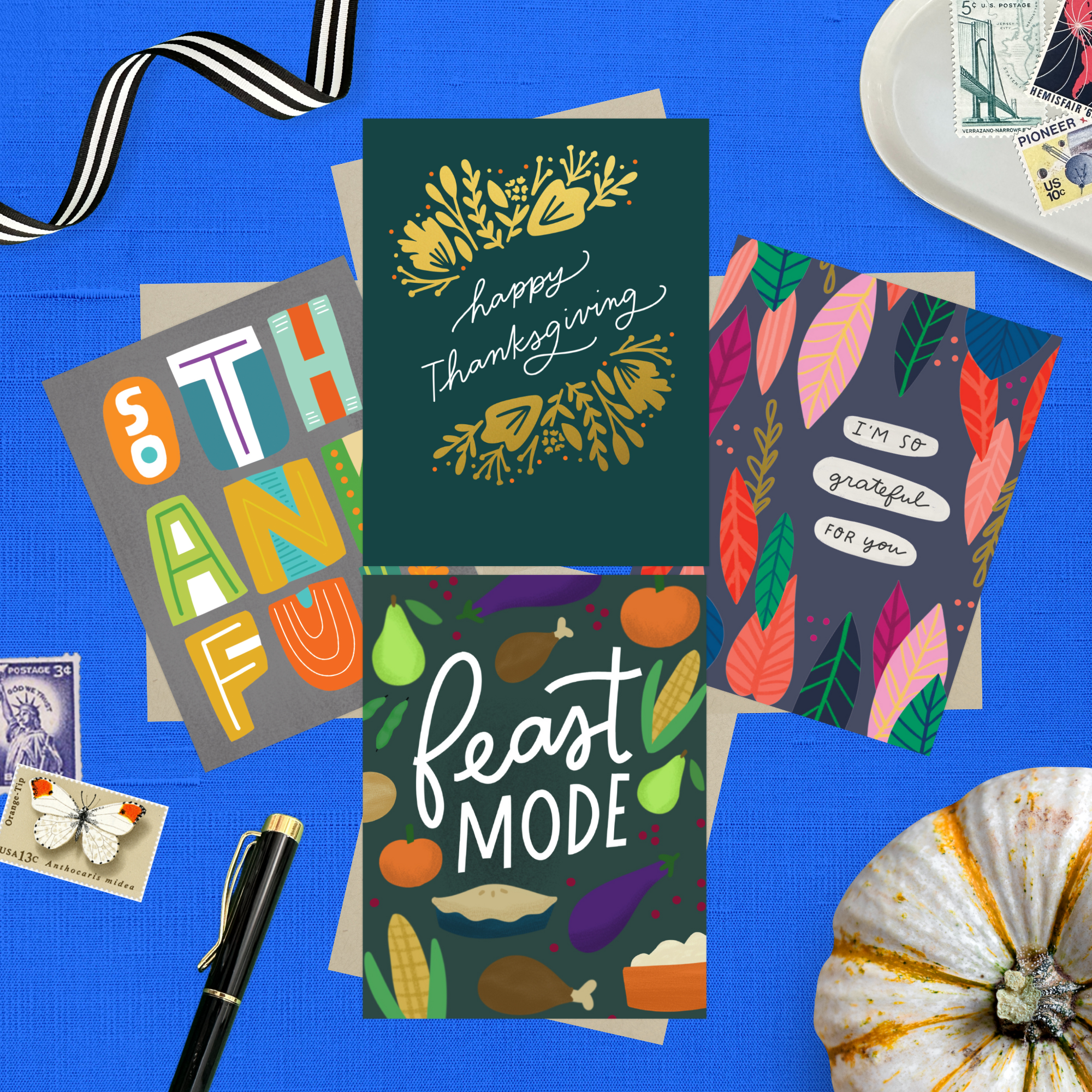 Collection of Thanksgiving-themed greeting cards on a blue background with decorative elements featuring "I'm so grateful for you," "Happy Thanksgiving," "Feast Mode," and "So Thankful."