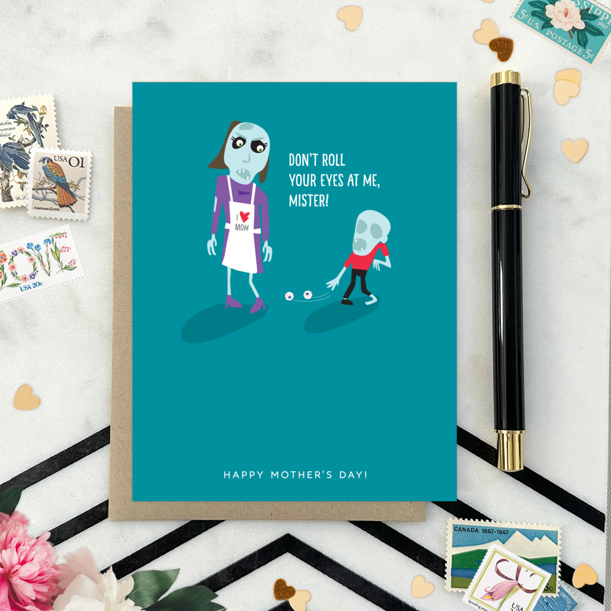 Mothers day greeting card with 2 zombies, one's eyes on the floor text 'don't roll your eyes at me, mister..happy mothers day'