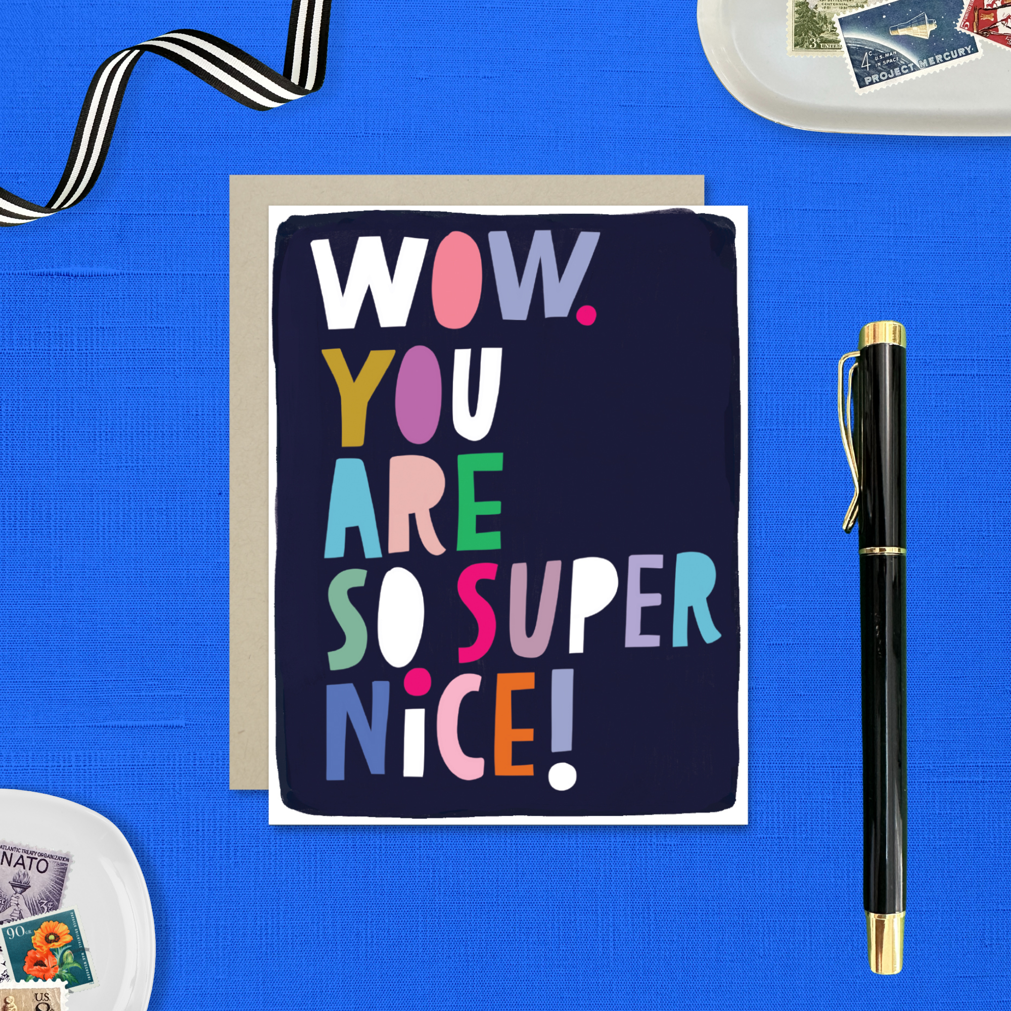 Thank you greeting card with illustrated and colorful lettering that says wow you are so super nice.