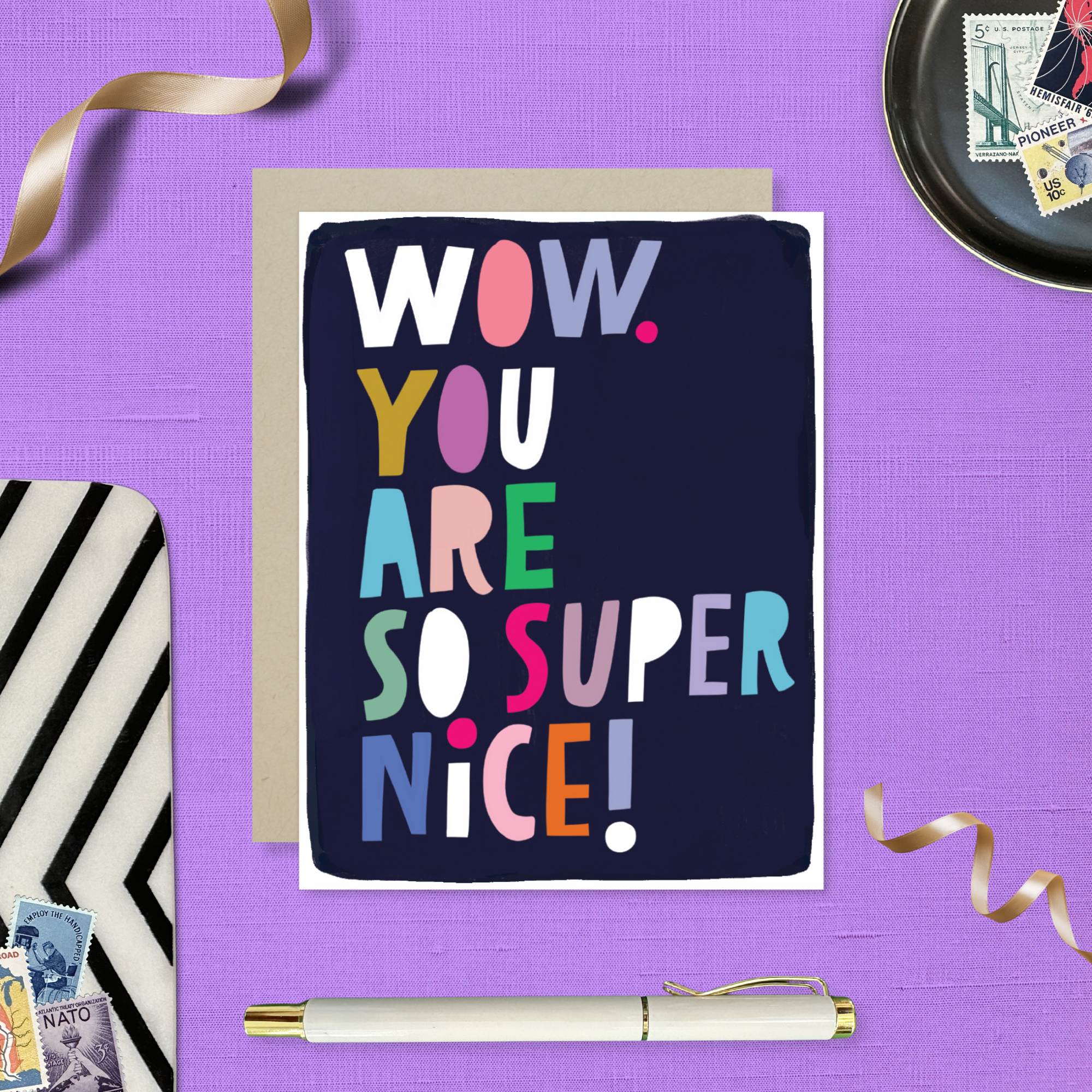 Thank you greeting card with illustrated and colorful lettering that says wow you are so super nice.