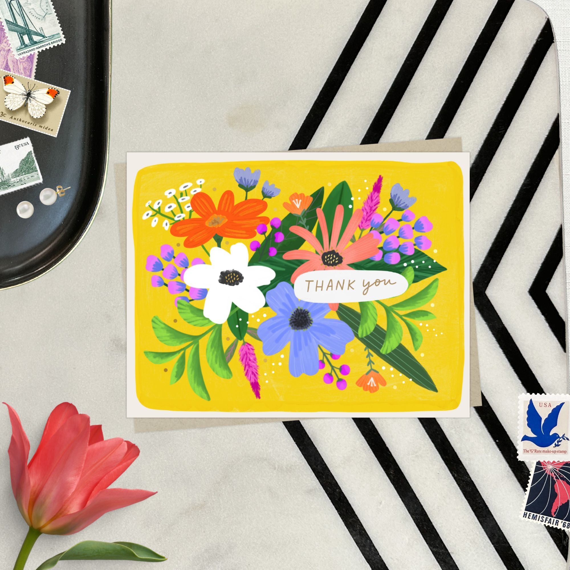Thank You Greeting card featuring colorful illustrated flowers.
