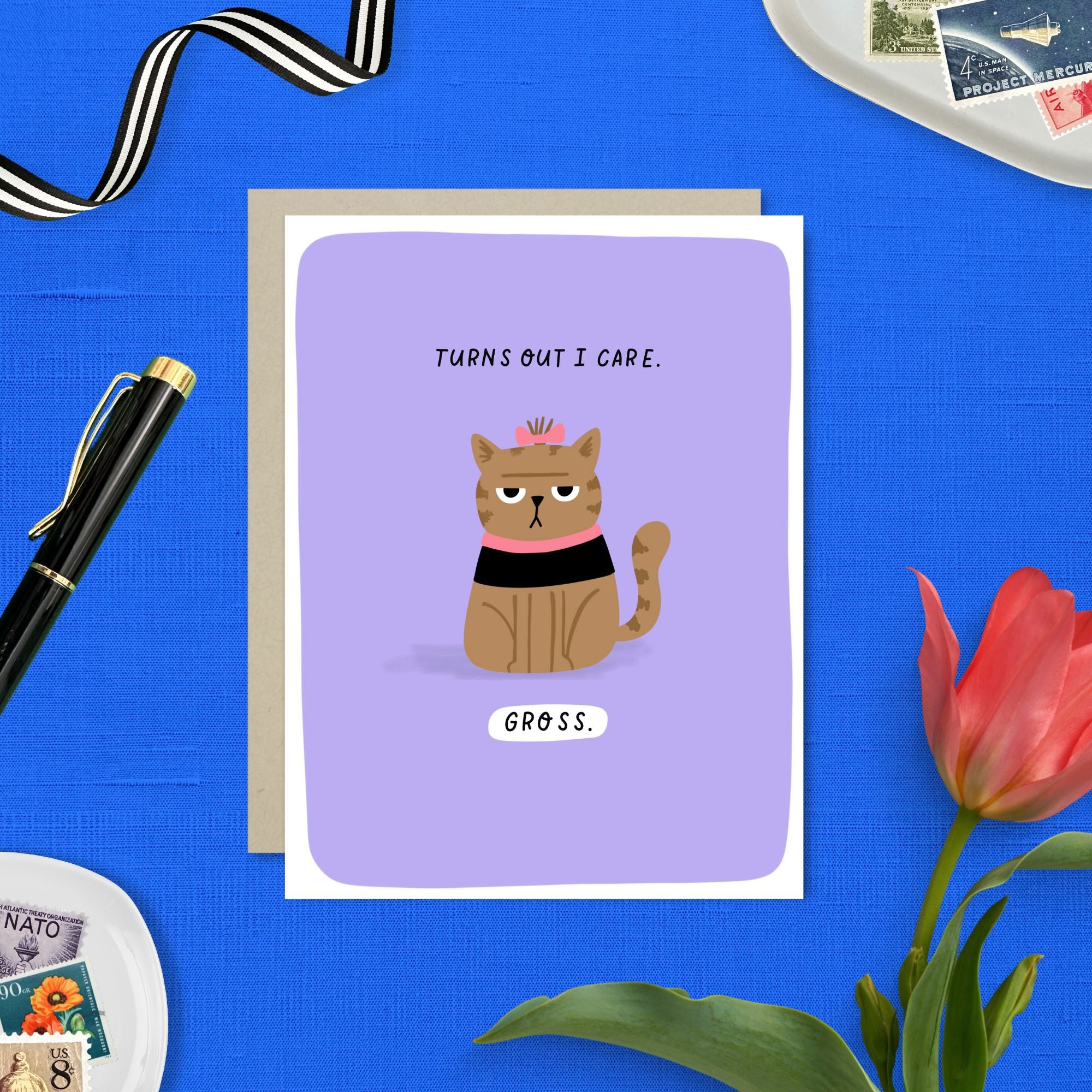 Funny greeting card with deadpan character and message of reluctant encouragement and support