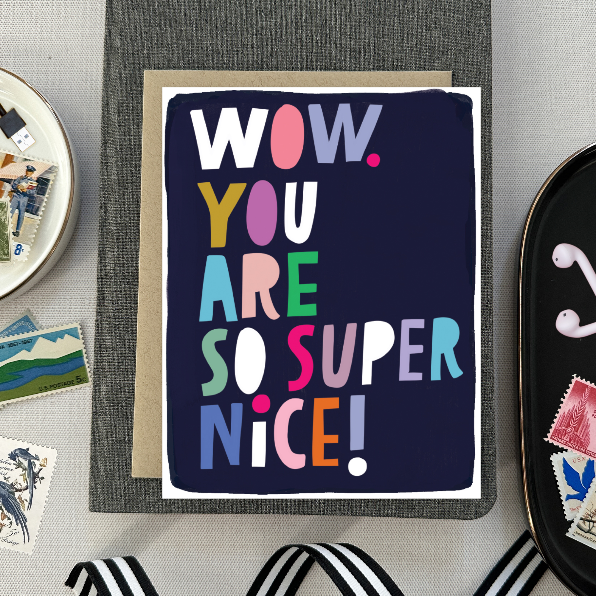 Thank you greeting card with illustrated and colorful lettering that says wow you are so super nice.