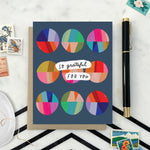Thank you greeting card featuring a grid of colorful, hand-painted patchwork circles and the handwritten words So Grateful for You.