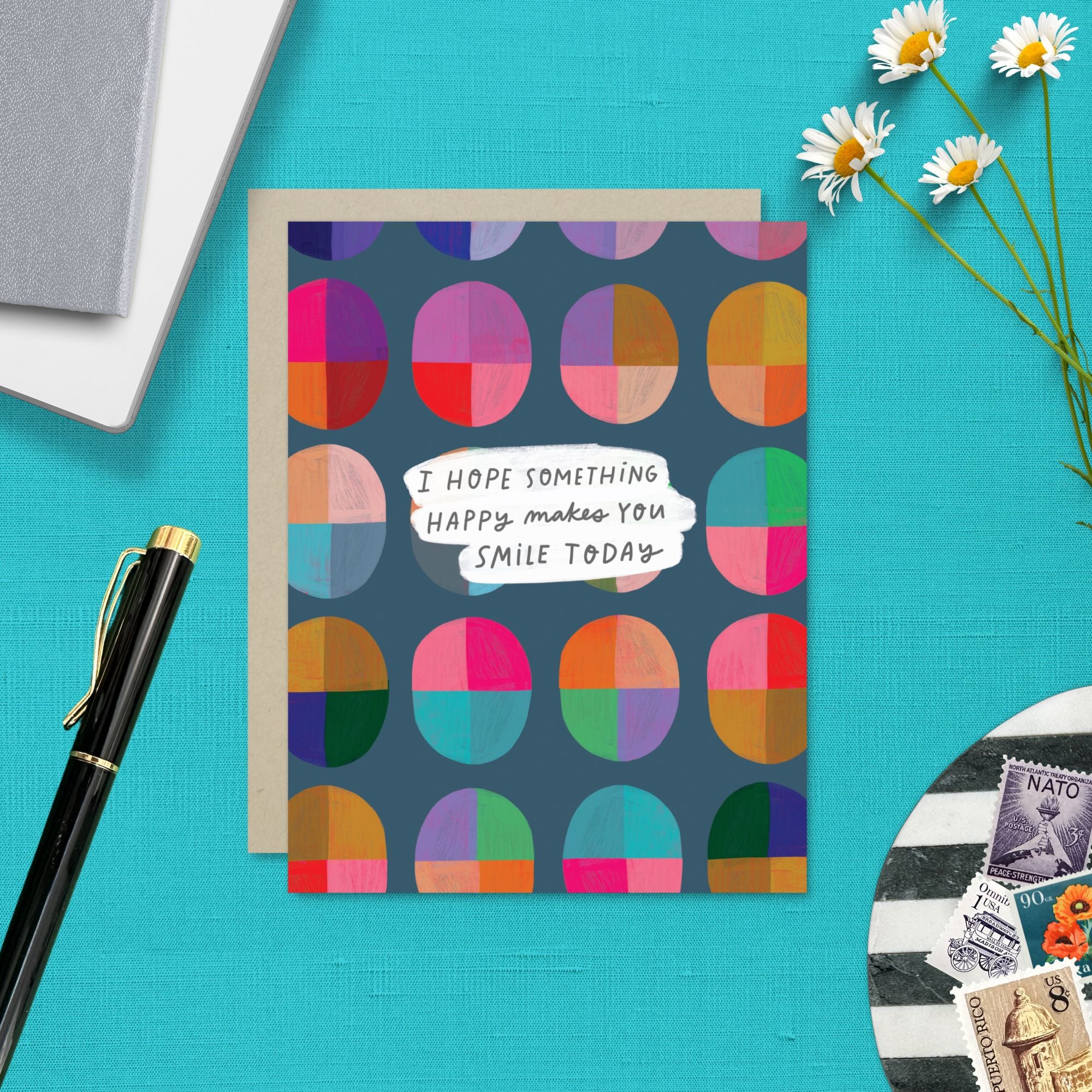 Uplifting greeting card with cheerful message “I hope something happy makes you smile today” and bright, colorful design