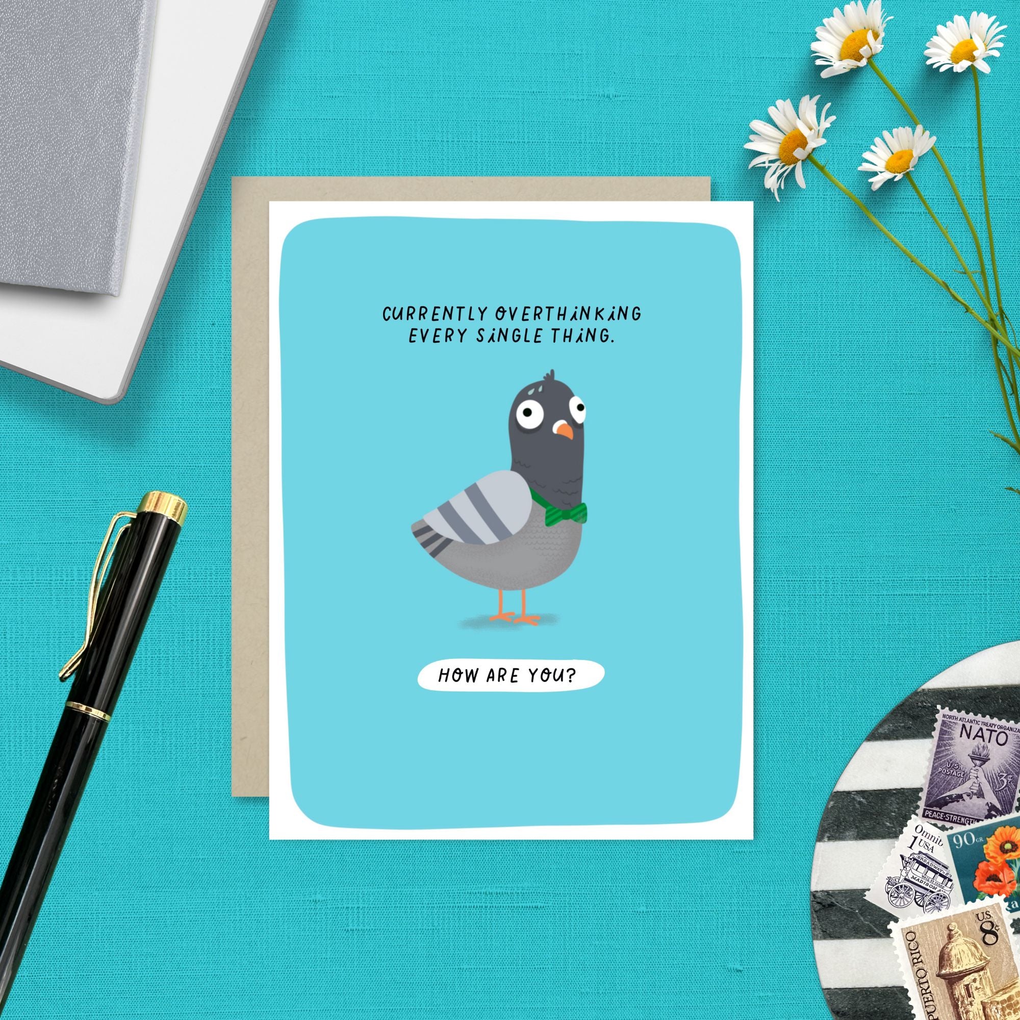 Greeting card with illustrated pigeon and text that reads “Currently overthinking every single thing. How are you?”