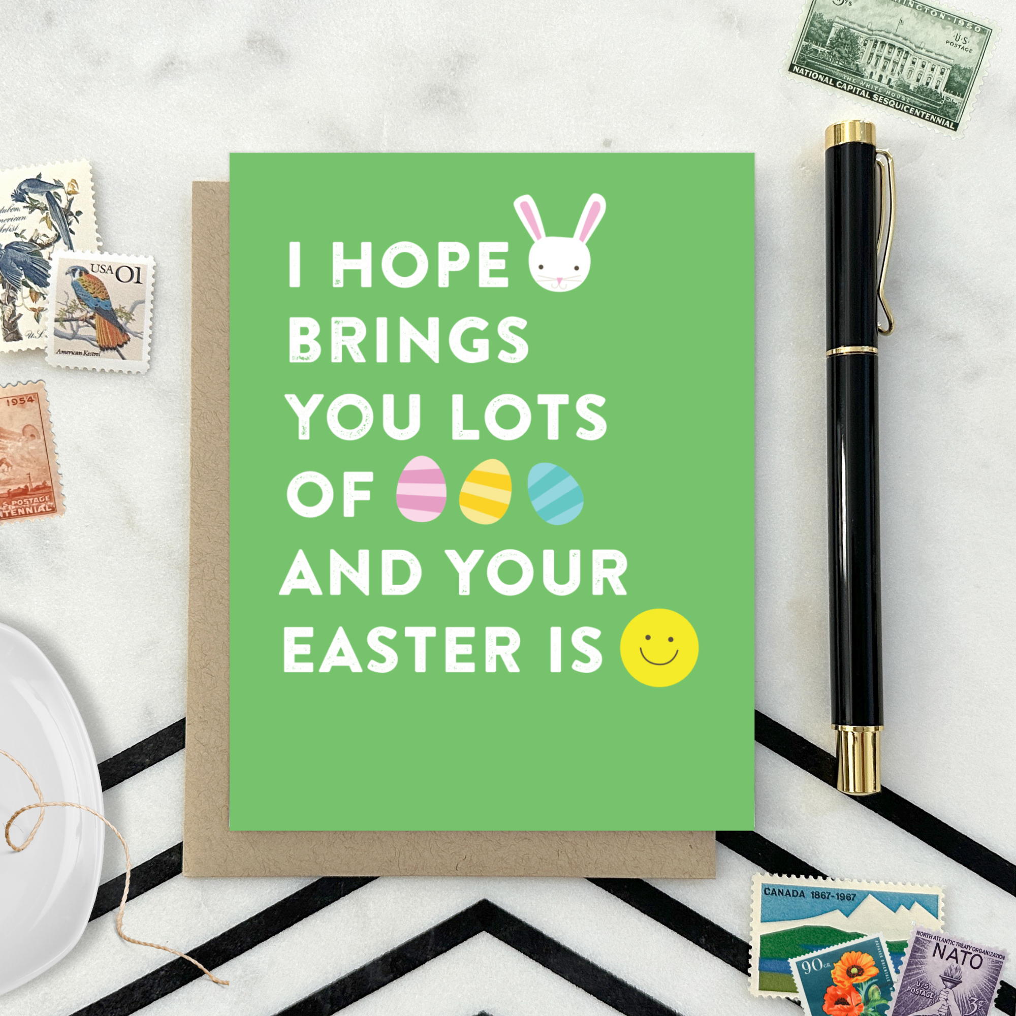 easter greeting card with text 'I hope your (bunny emoji) brings you lots of (egg emoji) and your easter is (smile emoji'