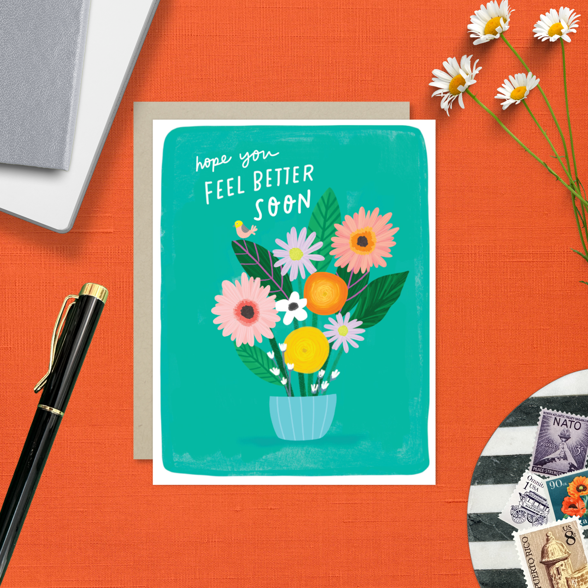 Get well greeting card with flowers and text 'Hope you feel better soon' on a colorful background