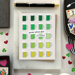 A st. patricks day greeting card with a grid of illustrated green beers in various shades and the text 'DRINK GREEN BEER - IRISH PROVERB'.