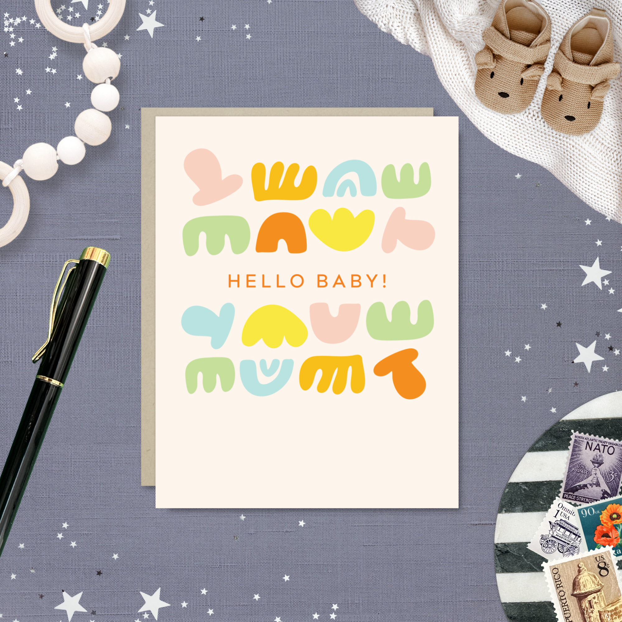Baby greeting card with colorful shapes and 'hello baby!' text