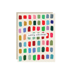 Holiday card with a grid of colorful painted swatches and the words 'Happy Holidays'.