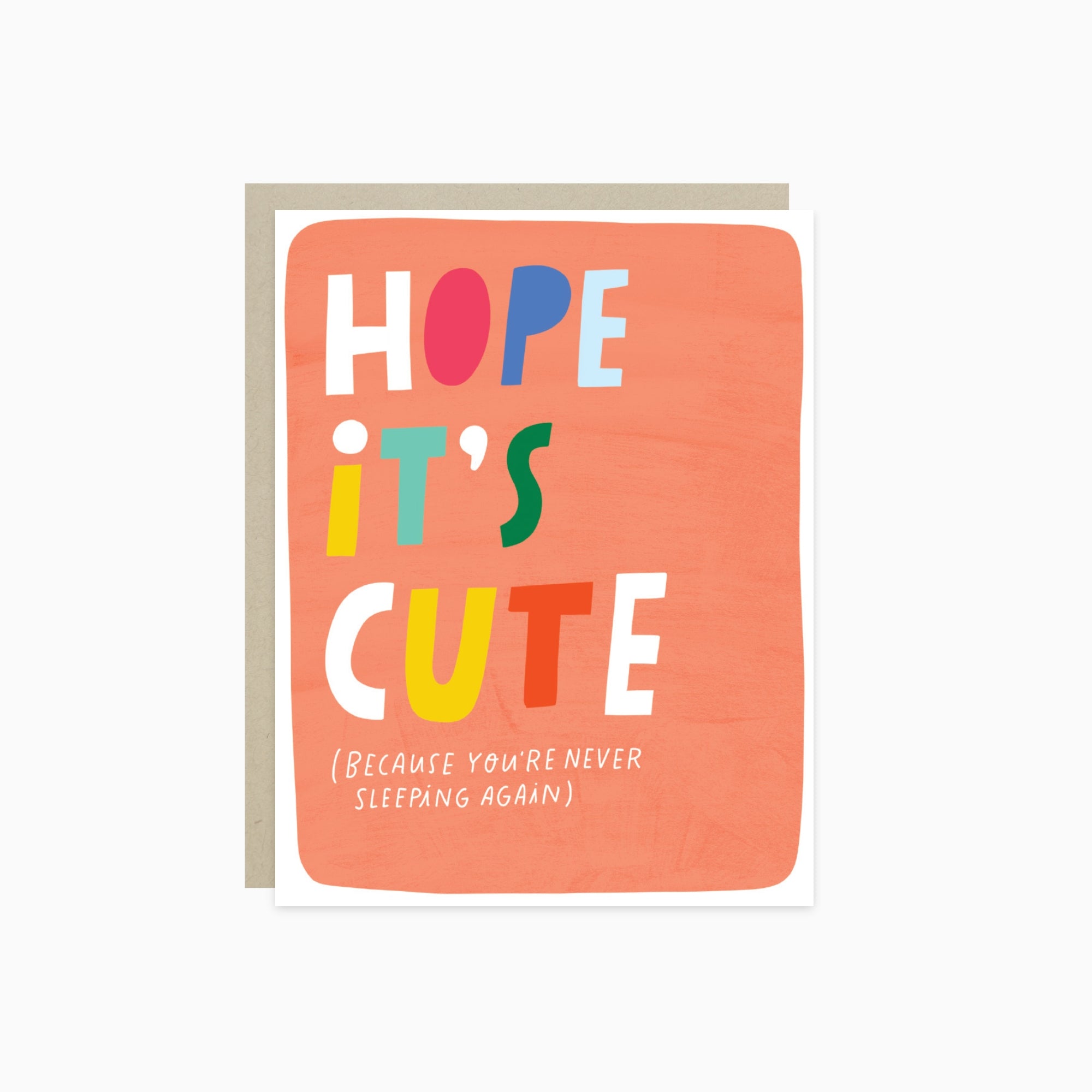 New baby greeting card with colorful text 'Hope it's cute (because you're never sleeping again)' on a white background