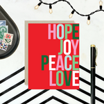 A red holiday greeting card with the words 'HOPE, JOY, PEACE, LOVE' stacked in a graphic design.