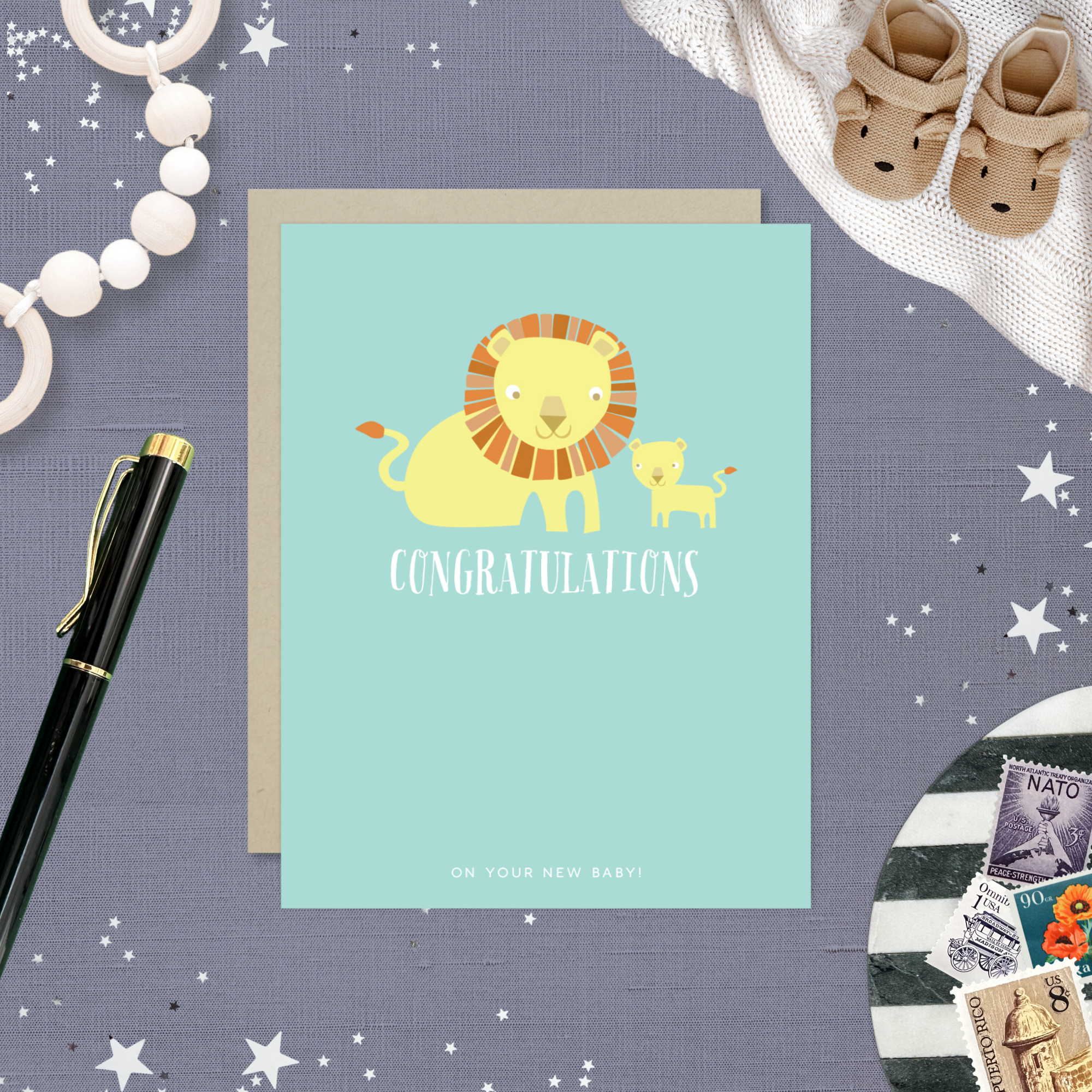 Baby greeting card with 2 lions and 'congratulations' text