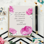 A wedding greeting card with hand-painted hydrangeas and a handwritten message.