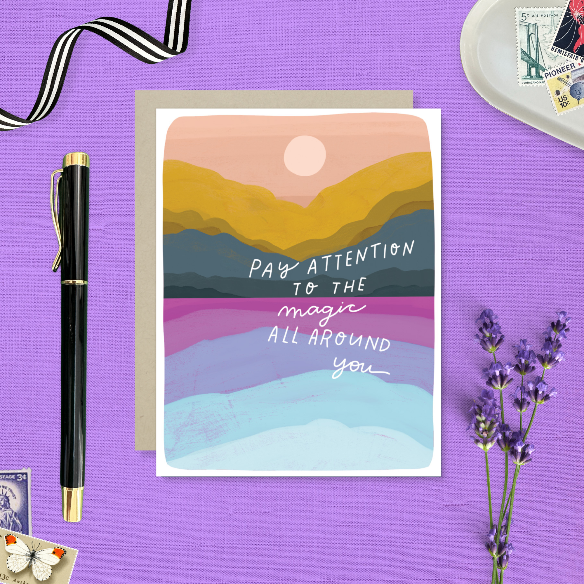 Encouragement greeting card with colorful landscape and the words 'pay attention to the magic all around you
