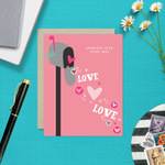 A Valentine's Day greeting card featuring a whimsical mailbox overflowing with love and playful hearts