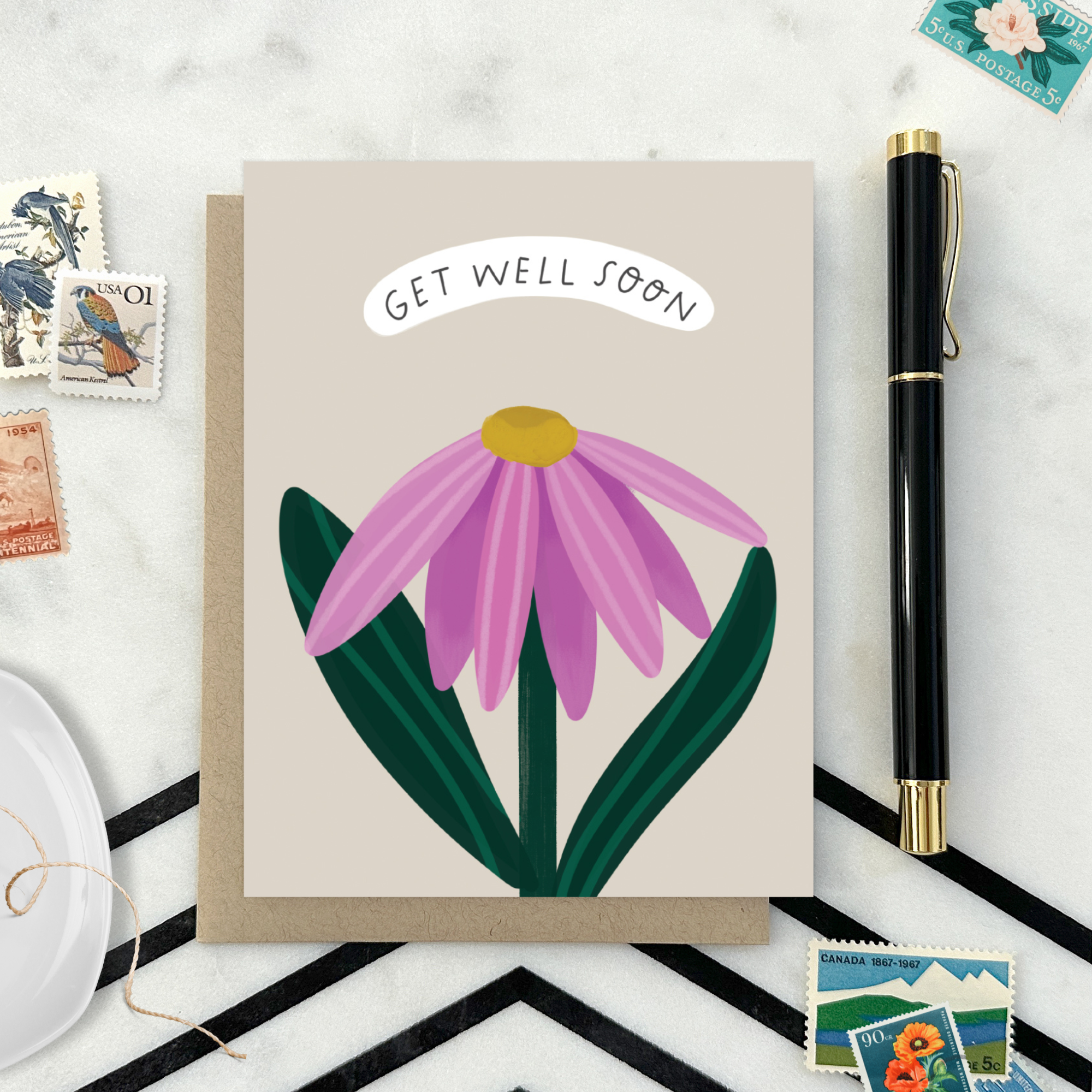 Get well soon greeting card with a single flower