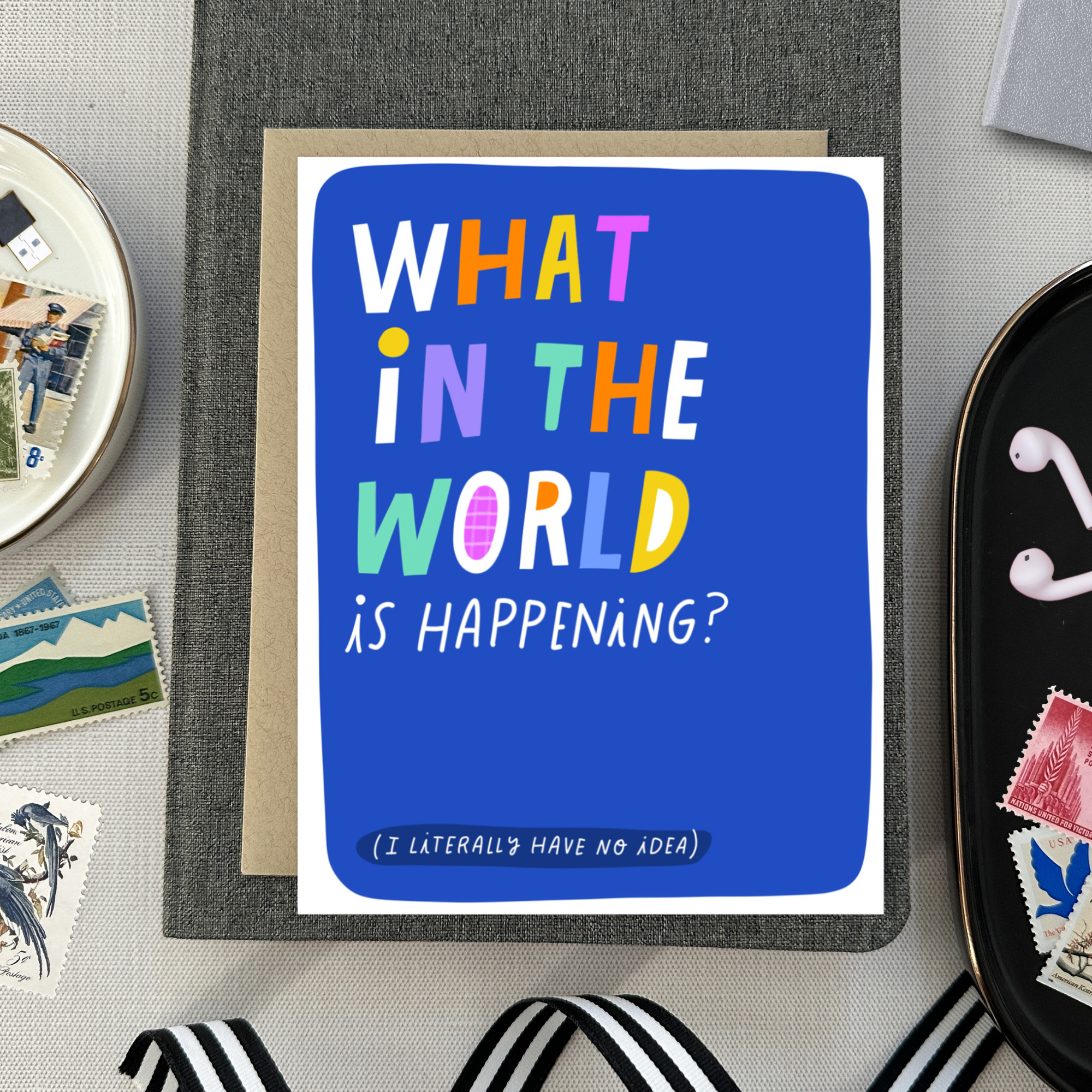 Friendship greeting card with 'what in the world is happened text'